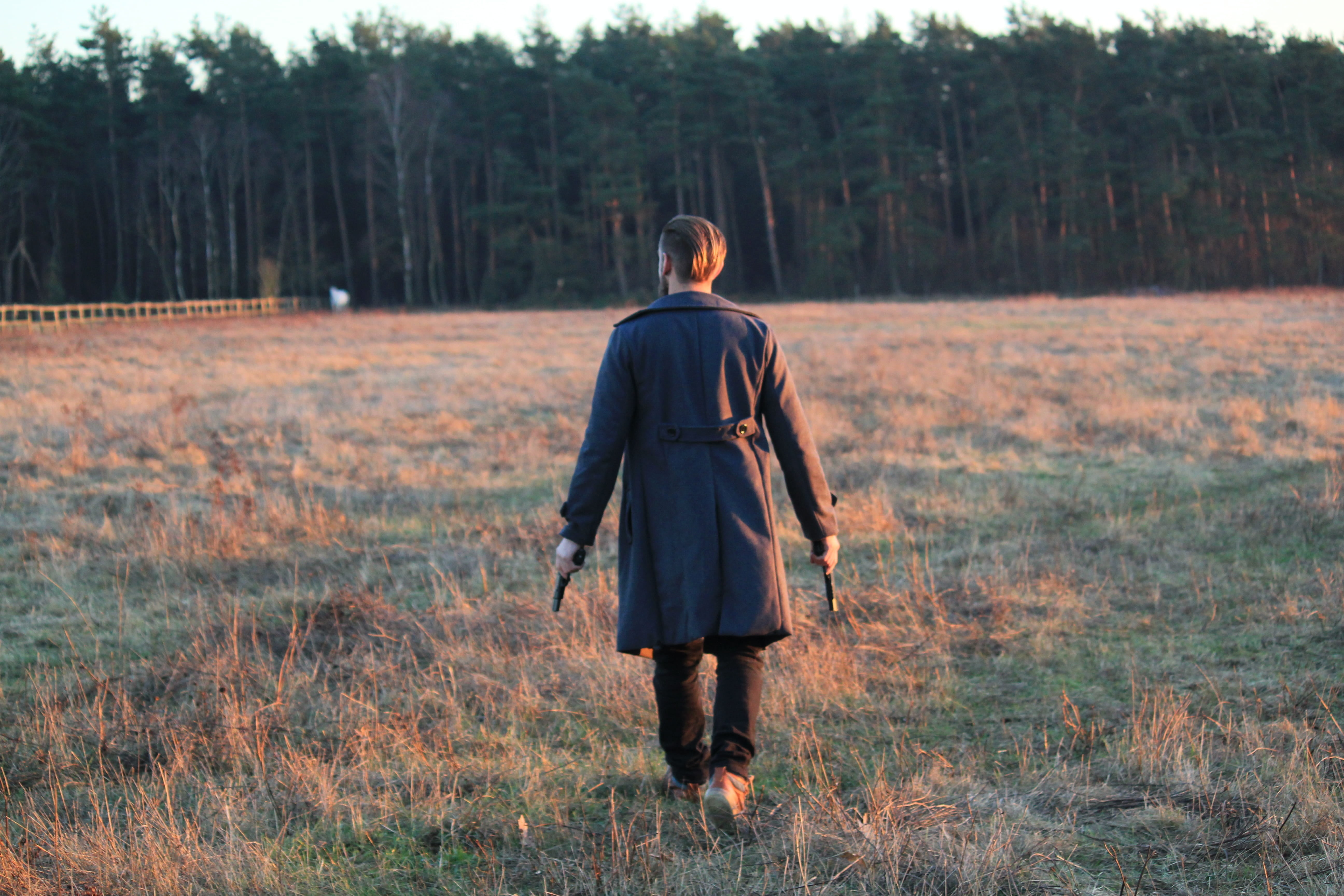 man, one person, weapons, real people, back view, immediately, day, daytime, forest, casual clothing, coat, guns, hairstyle, hair, clothing, walking, grass, HD Wallpaper