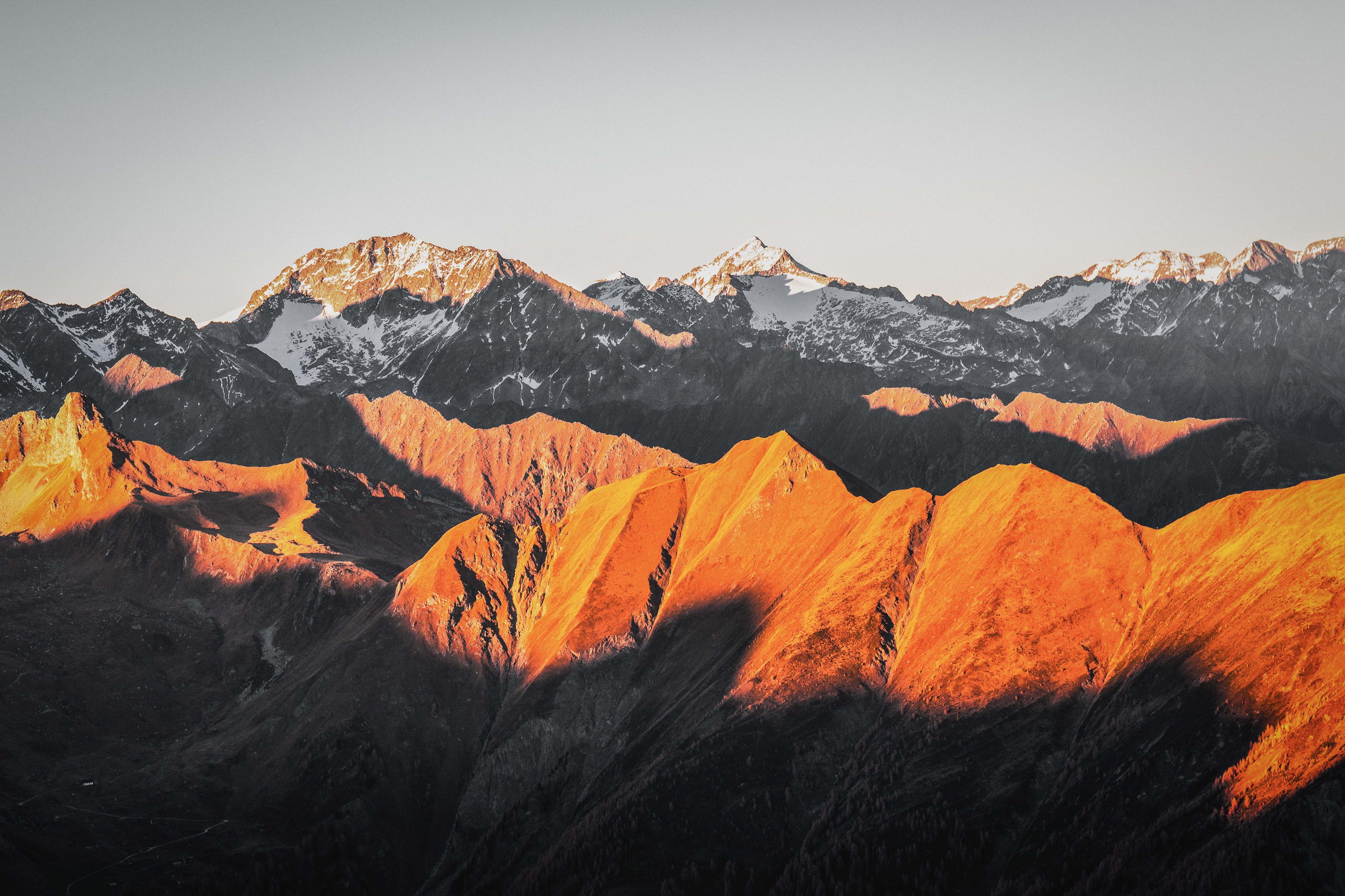 sunset light, tranquil scene, snow, sunset, land, covered, mountain ridge, rock - object, nature, beauty in nature, no people, outdoors, environment, summit, HD Wallpaper