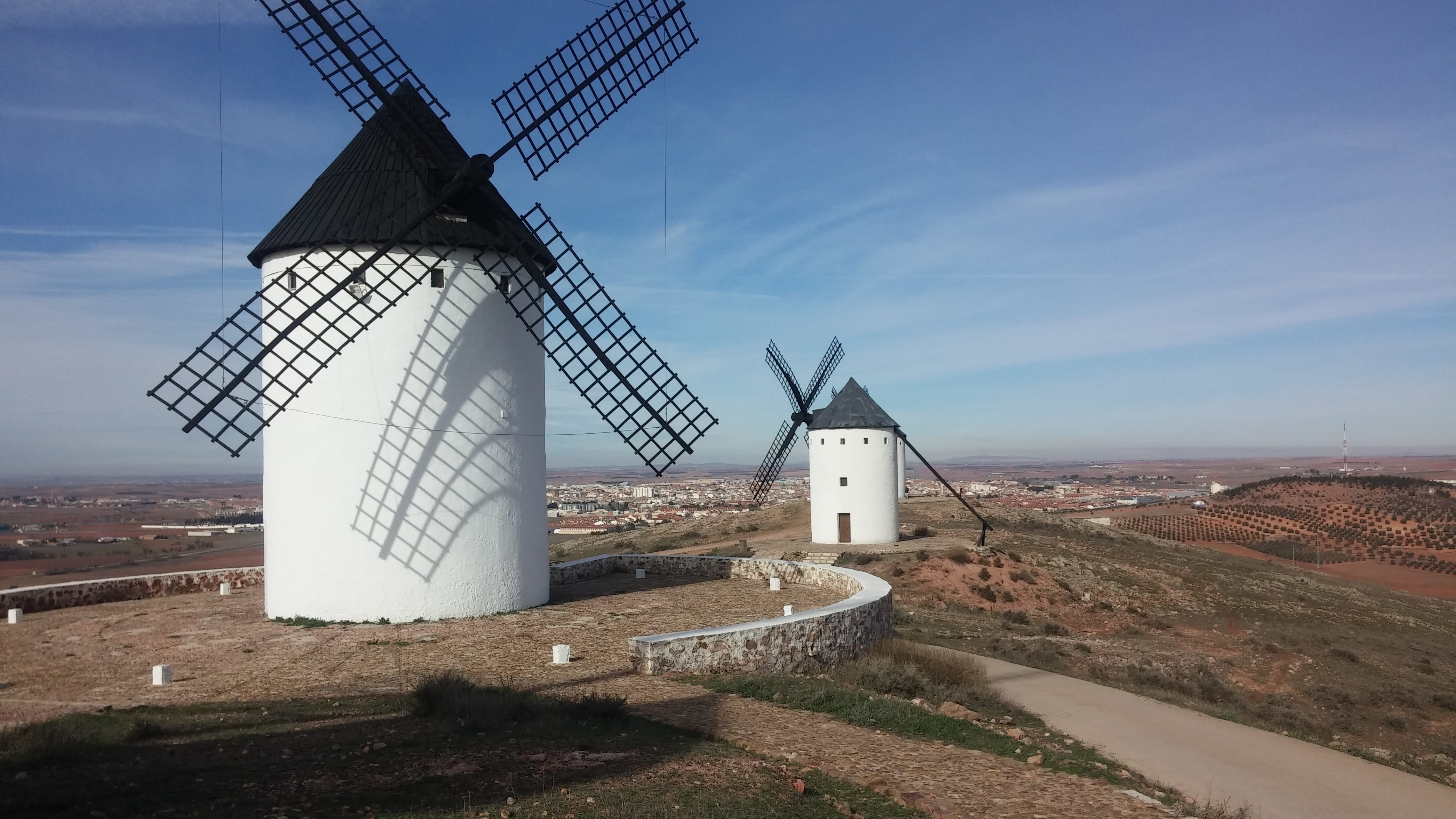 Windmills, day, wind turbine, famous Place, landscape, travel Locations, alternative energy, land, sky, Mills, outdoors, no people, landmarks, castile la mancha, HD Wallpaper
