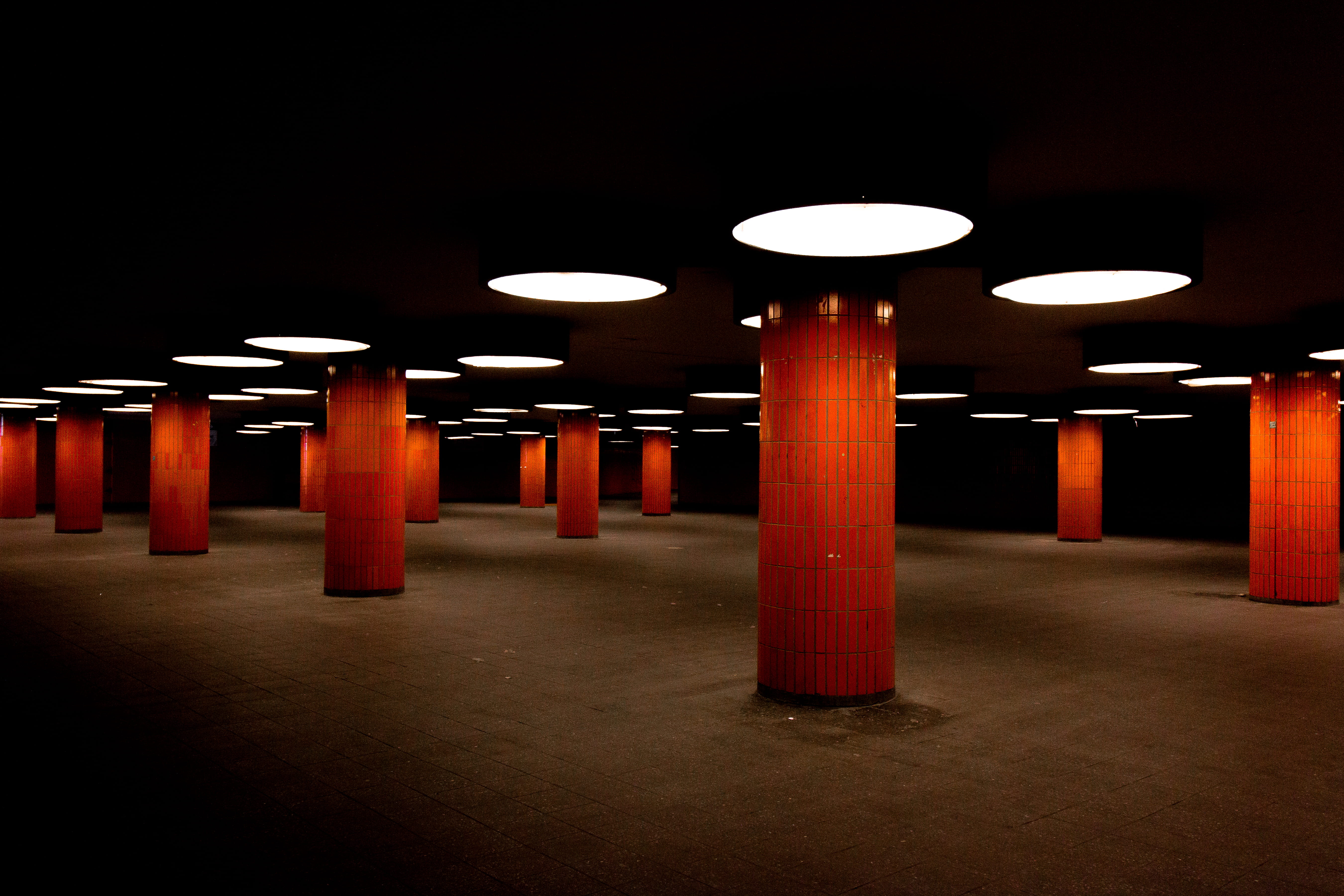 dark, modern, parking garage, empty, built structure, indoors, flooring, in a row, electric light, light fixture, atmosphere, columns, no people, architectural column, HD Wallpaper
