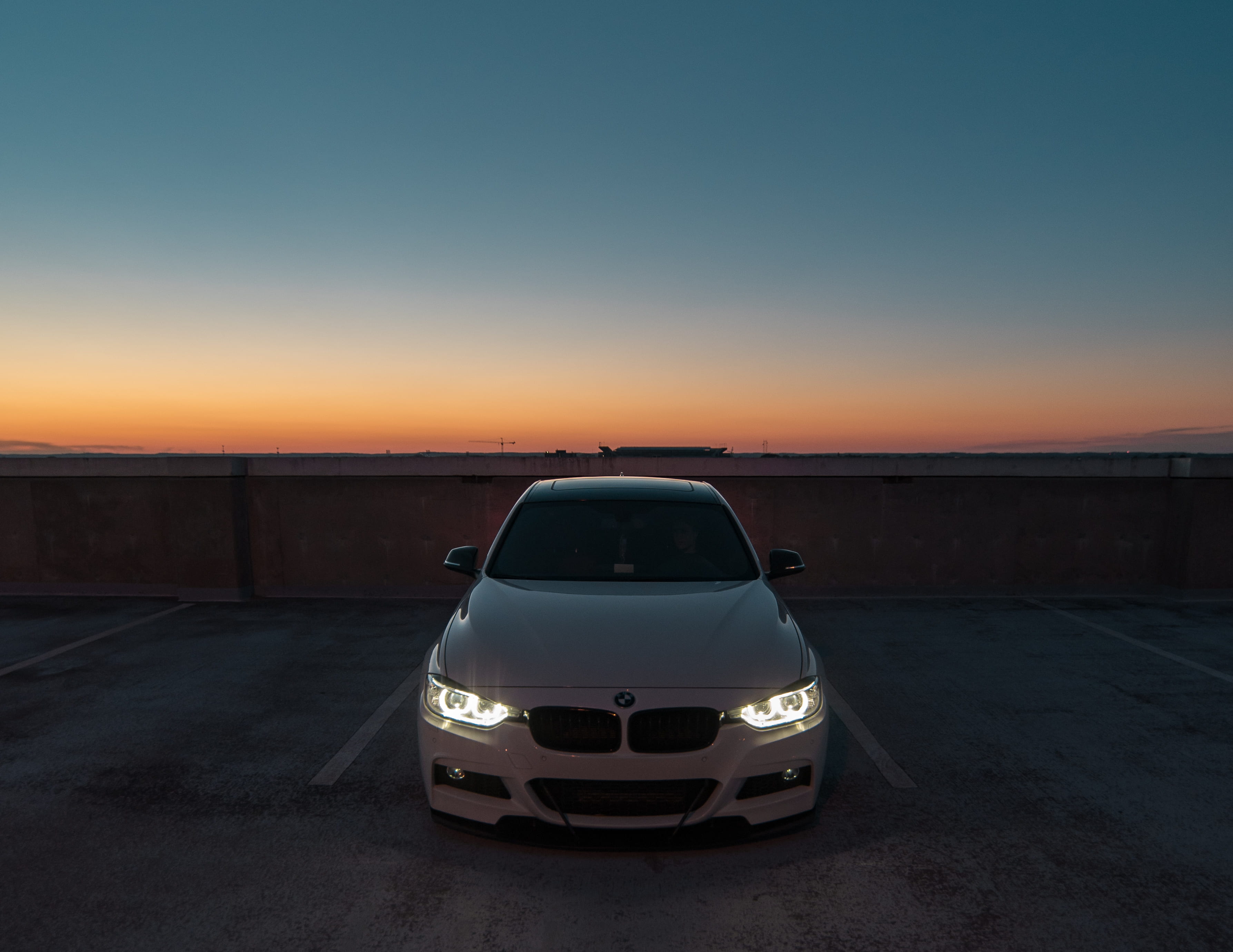near, copy space, illuminated, land vehicle, nature, parked, transportation, wall, clear sky, airport runway, car park, car, orange color, 3 series, airport, HD Wallpaper