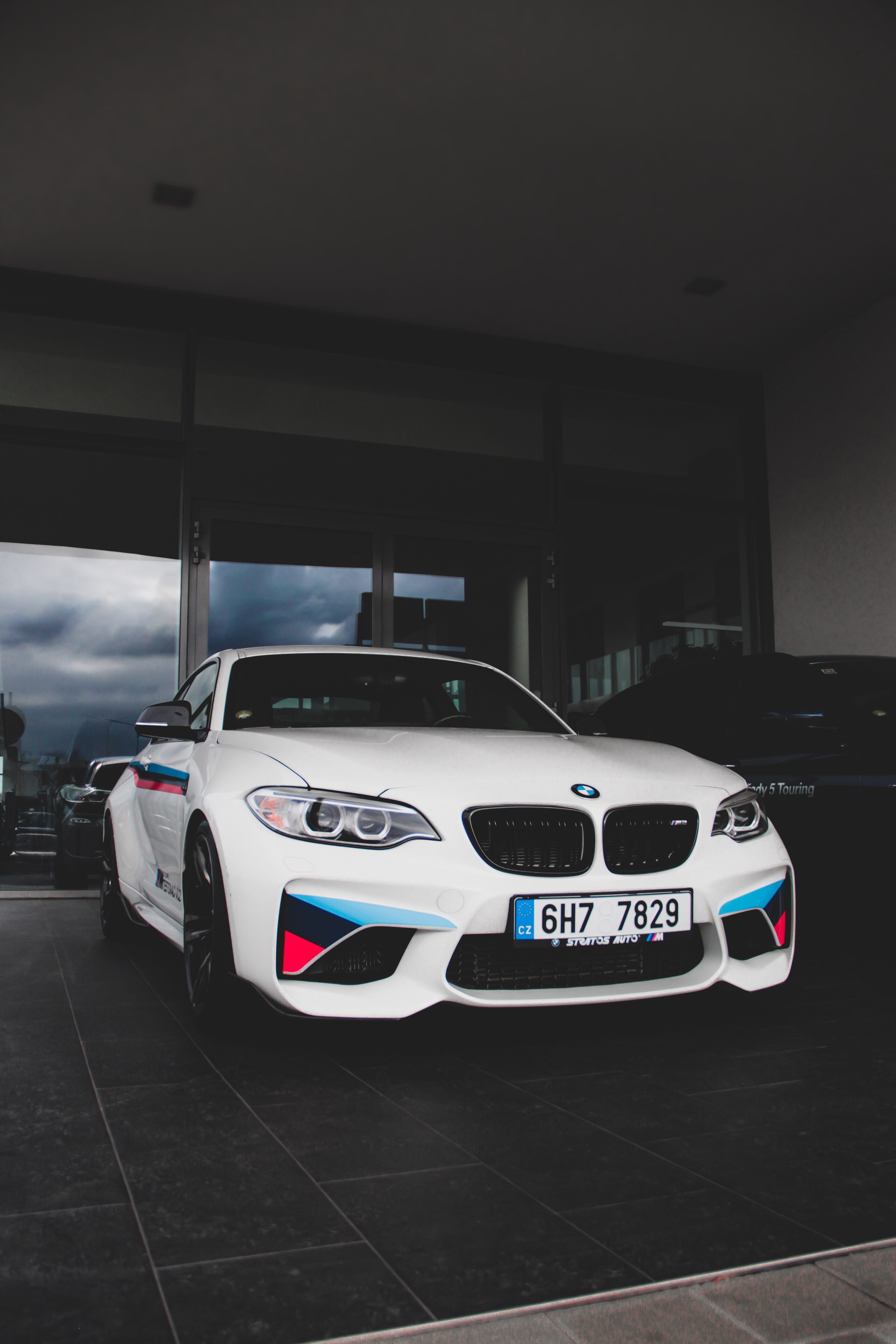 built structure, fast, garage, white, western script, toy, inside, no people, security, architecture, tire, alloy wheel, m2, vehicle, communication, wheel, Phone HD Wallpaper