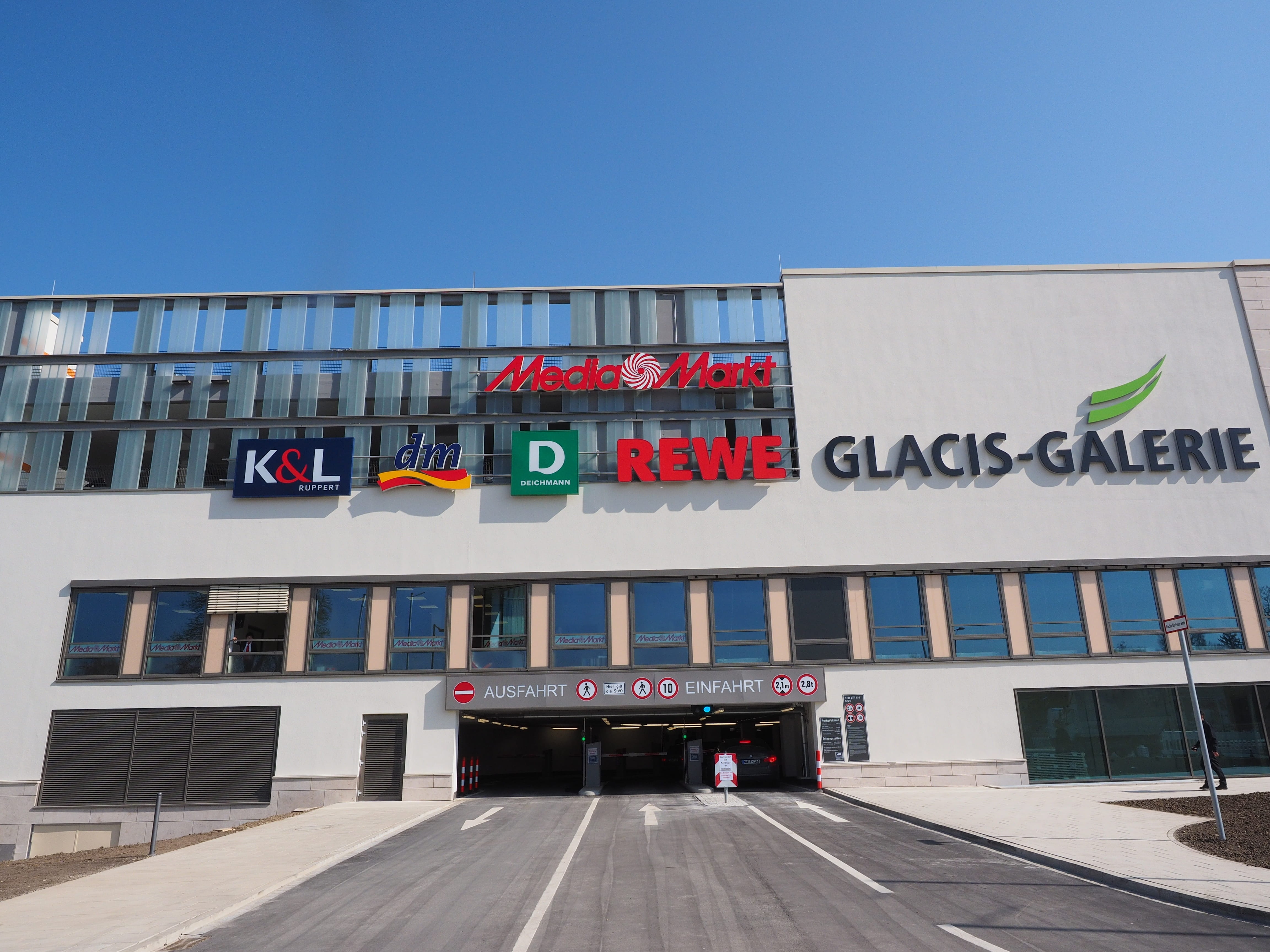 shopping center, city, sign, advertisement, western script, no people, gateway, rewe, shopping, low angle view, text, day, dm, multi storey car park, built structure, HD Wallpaper