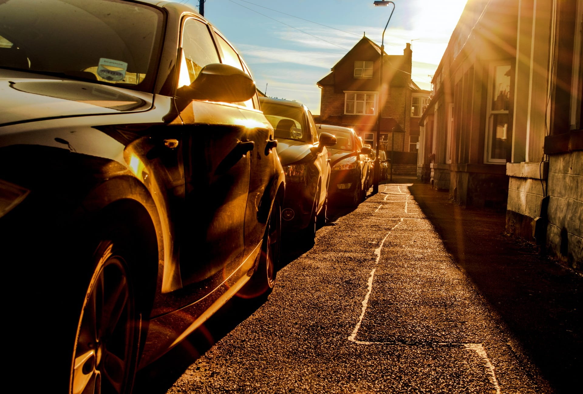 outdoors, city, the way forward, nature, shadows, in a row, beside, day, town, no people, cars, park, car, sky, cloud - sky, buildings, inlined, sun, daytime, HD Wallpaper