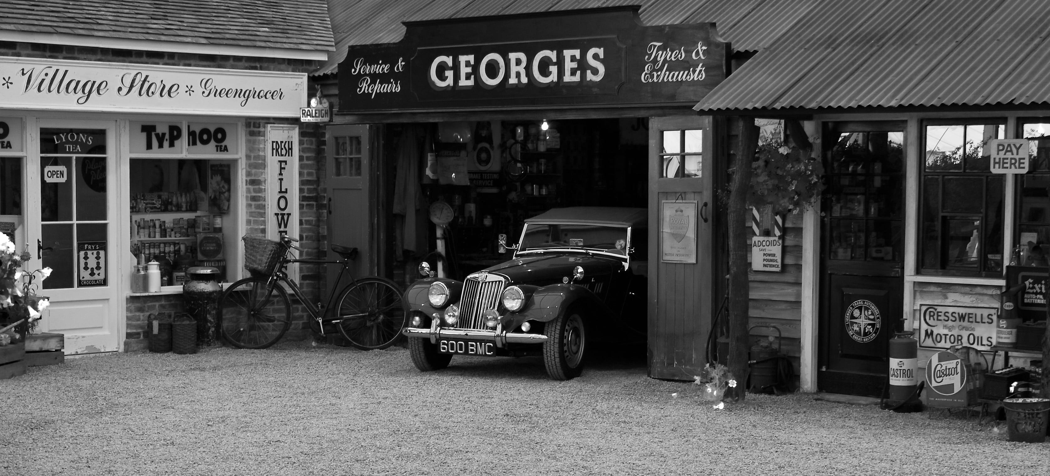 black and white, store, adult, vintage car, car, outdoors, people, text, mode of transportation, building exterior, communication, retail, architecture, HD Wallpaper