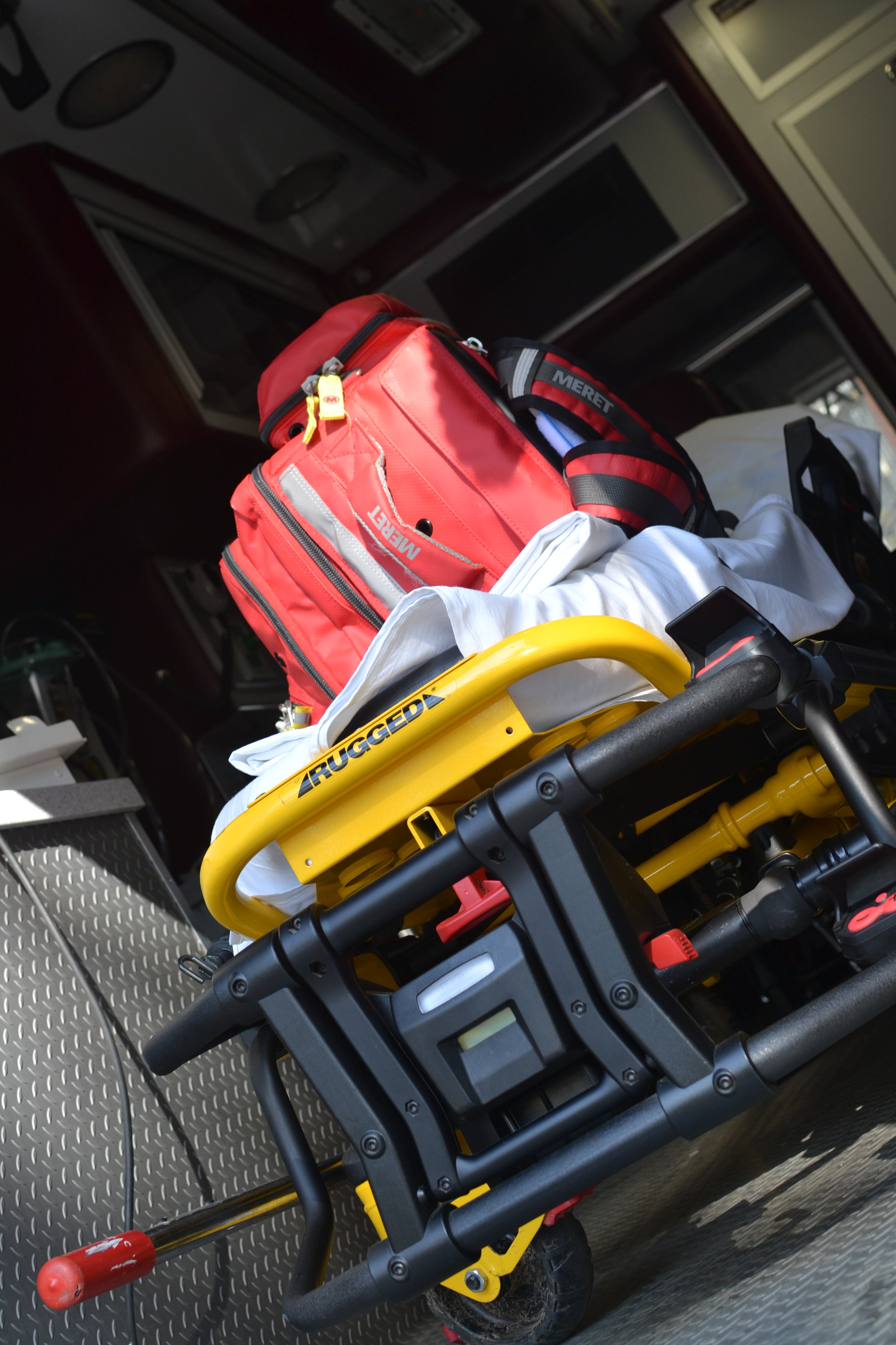 land vehicle, indoors, sport, medic, professional sport, stationary, mode of transportation, no people, hospital, red, ems, sports equipment, medical, day, Phone HD Wallpaper