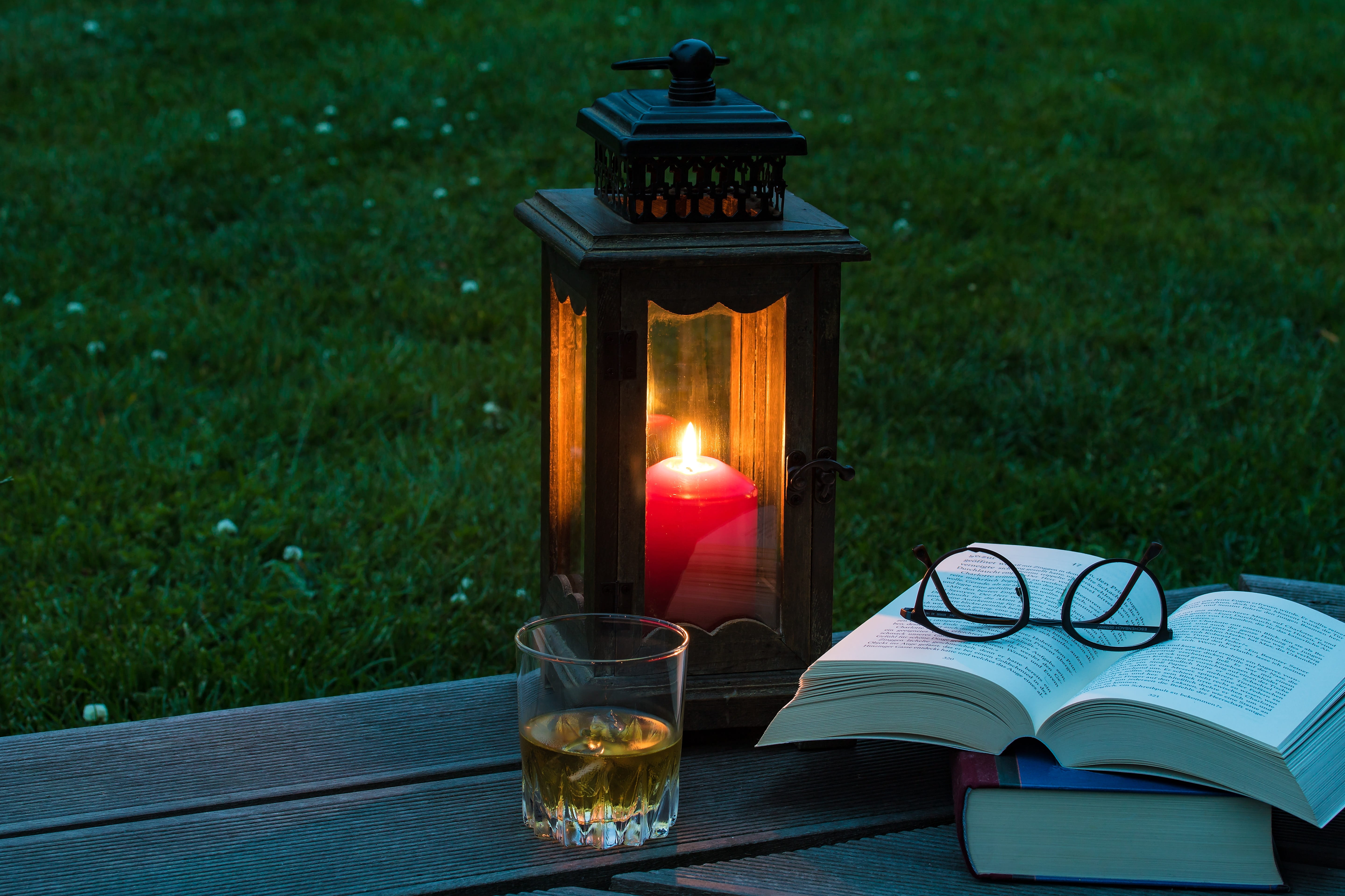 outdoors, publication, heat - temperature, plant, close-up, lantern, reading glasses, grass, good evening, books, nature, summer evening, illuminated, fire, HD Wallpaper