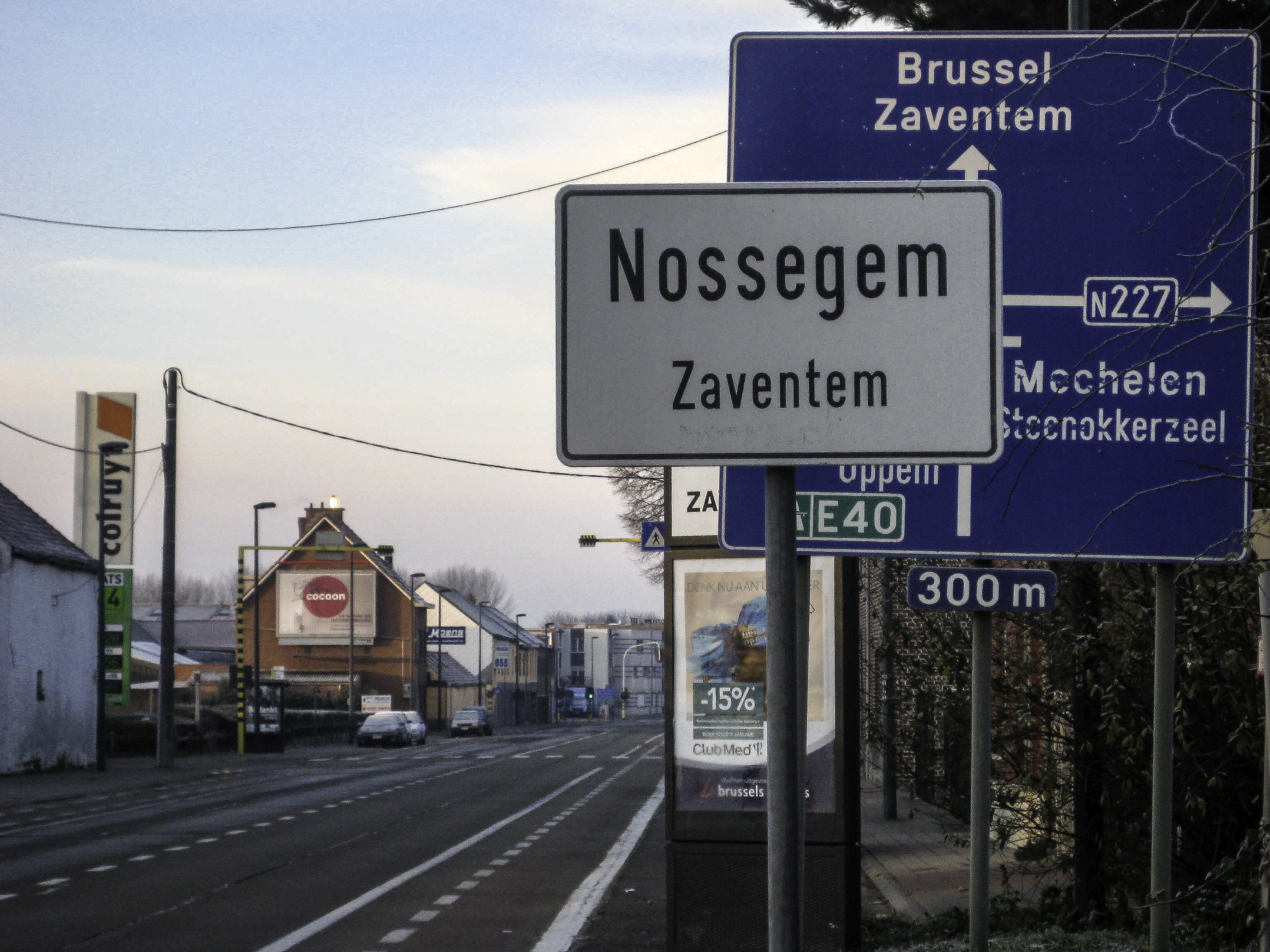 western script, direction, no people, main, information, railroad Track, outdoors, public domain, transportation, signs, road, city, Nossegem, road between, HD Wallpaper