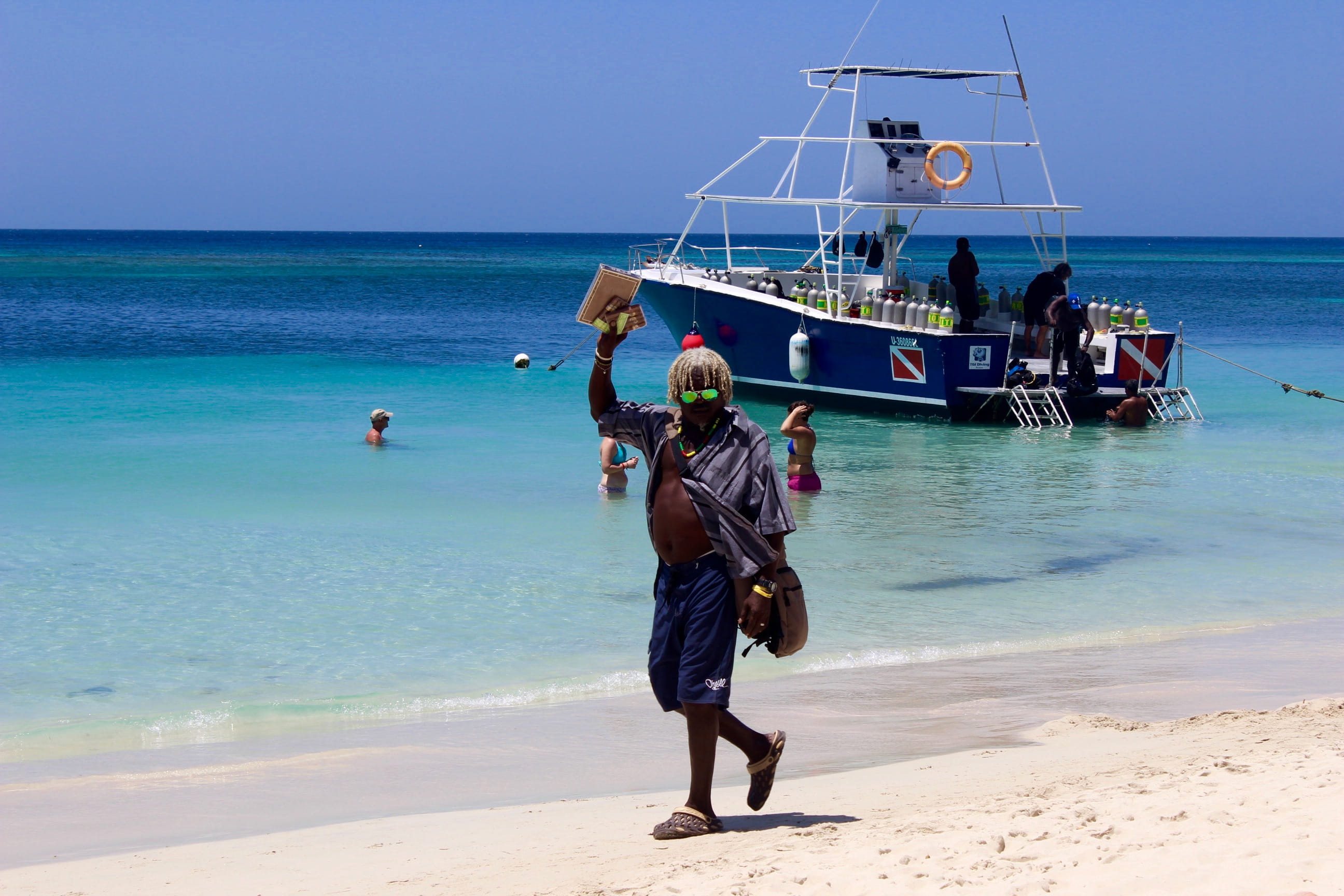 beach, ocean, day, incidental people, roatan, honduras, full length, sky, boat, beauty in nature, fisherman, nature, blue, white, sand, central america, HD Wallpaper