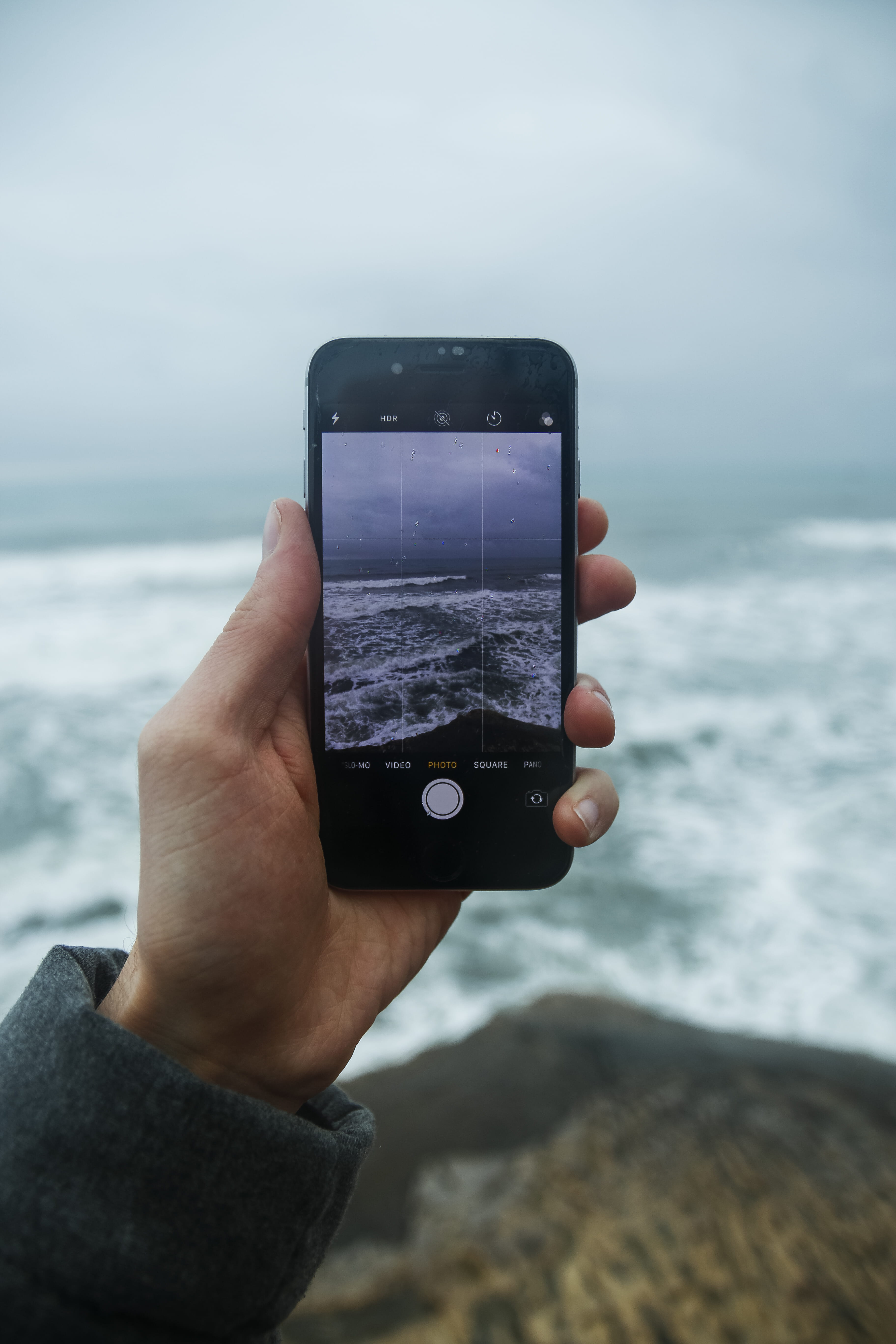 technology, mobile phone, face, phone, beach, photography, wireless technology, ipod, water, sea, portable information device, holding, horizon over water, Phone HD Wallpaper