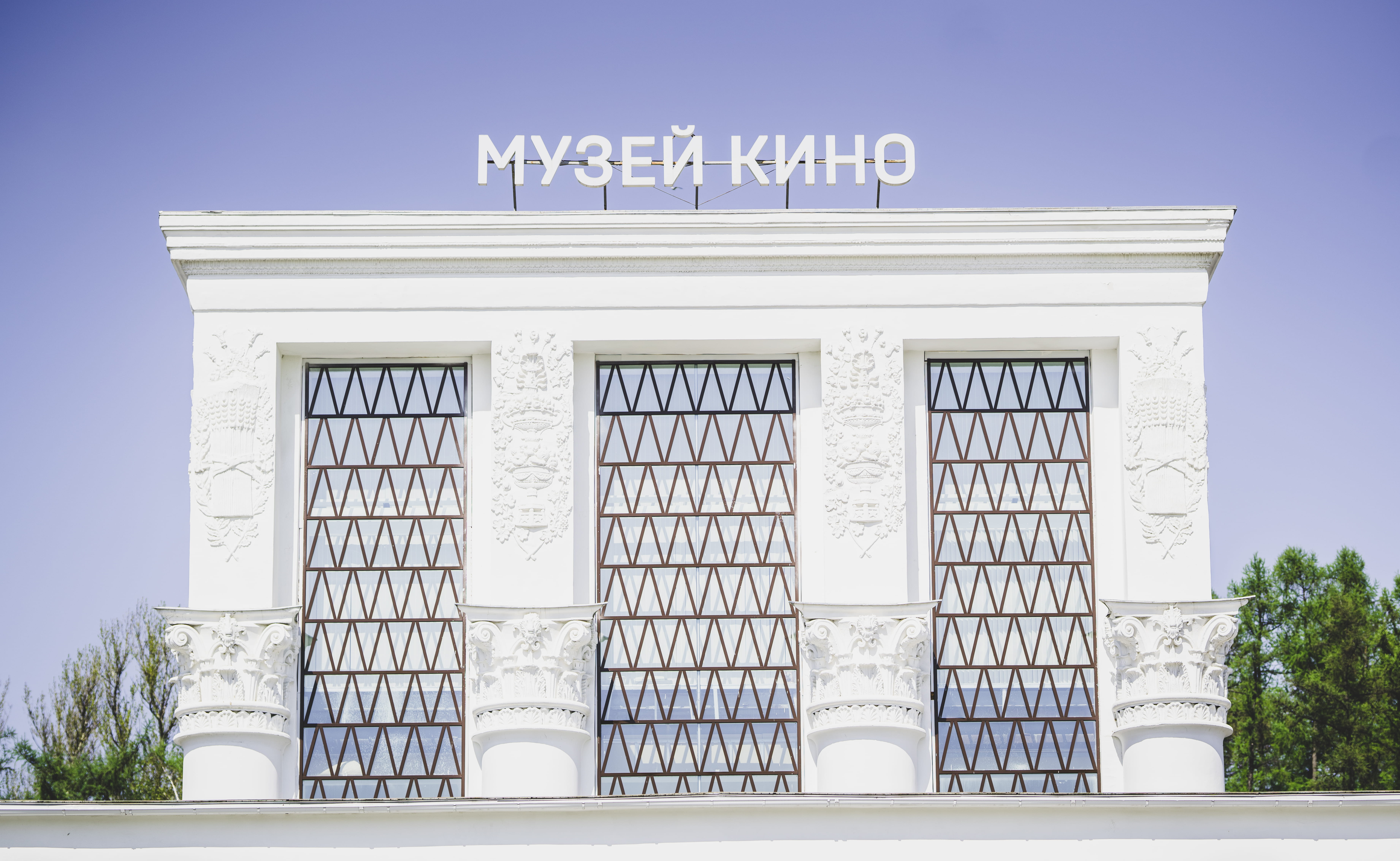 office building, symmetry, cinema, door, white, housing, day, no people, facade, text, low angle view, picture window, architecture, 5K, building, window, HD Wallpaper