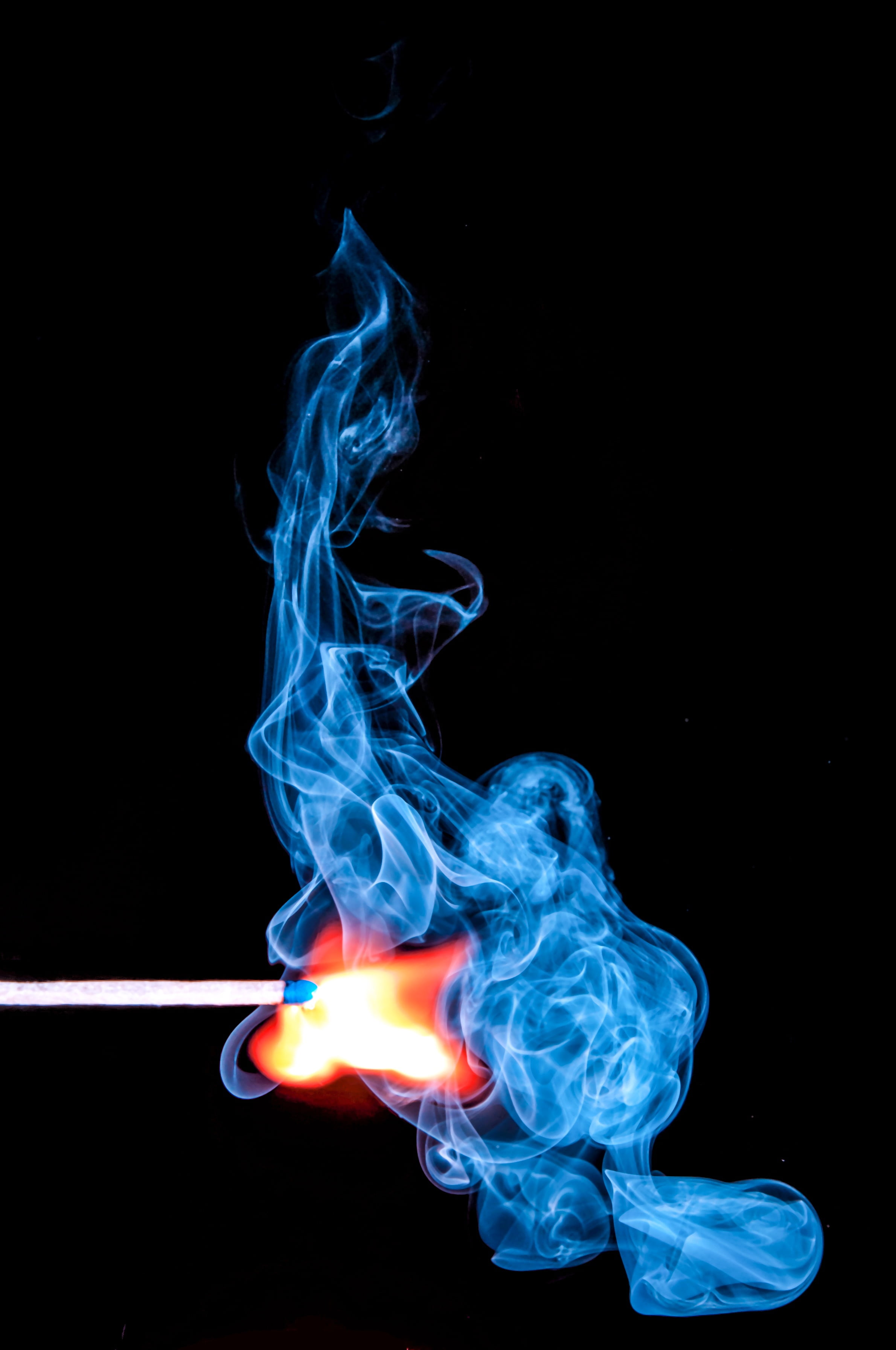 motion, fire - natural phenomenon, smoke, close, day, black background, lighted, sticks, blue, no people, illuminated, close-up, moving up, fire, flame, Phone HD Wallpaper