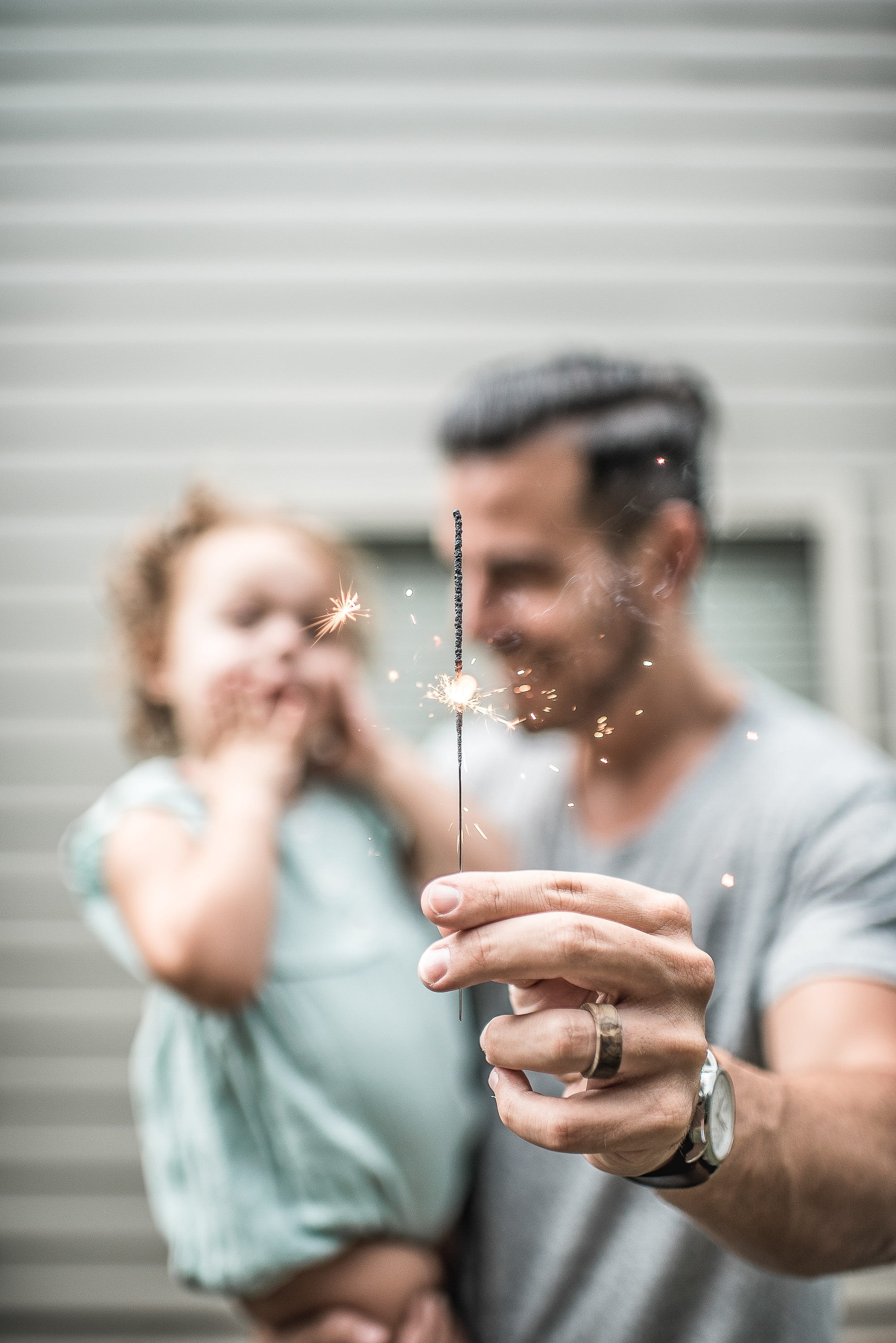 standing, young adult, leisure activity, young men, watch, hand, casual clothing, activity, focus on foreground, two people, daughter, males, father, lifestyles, Phone HD Wallpaper