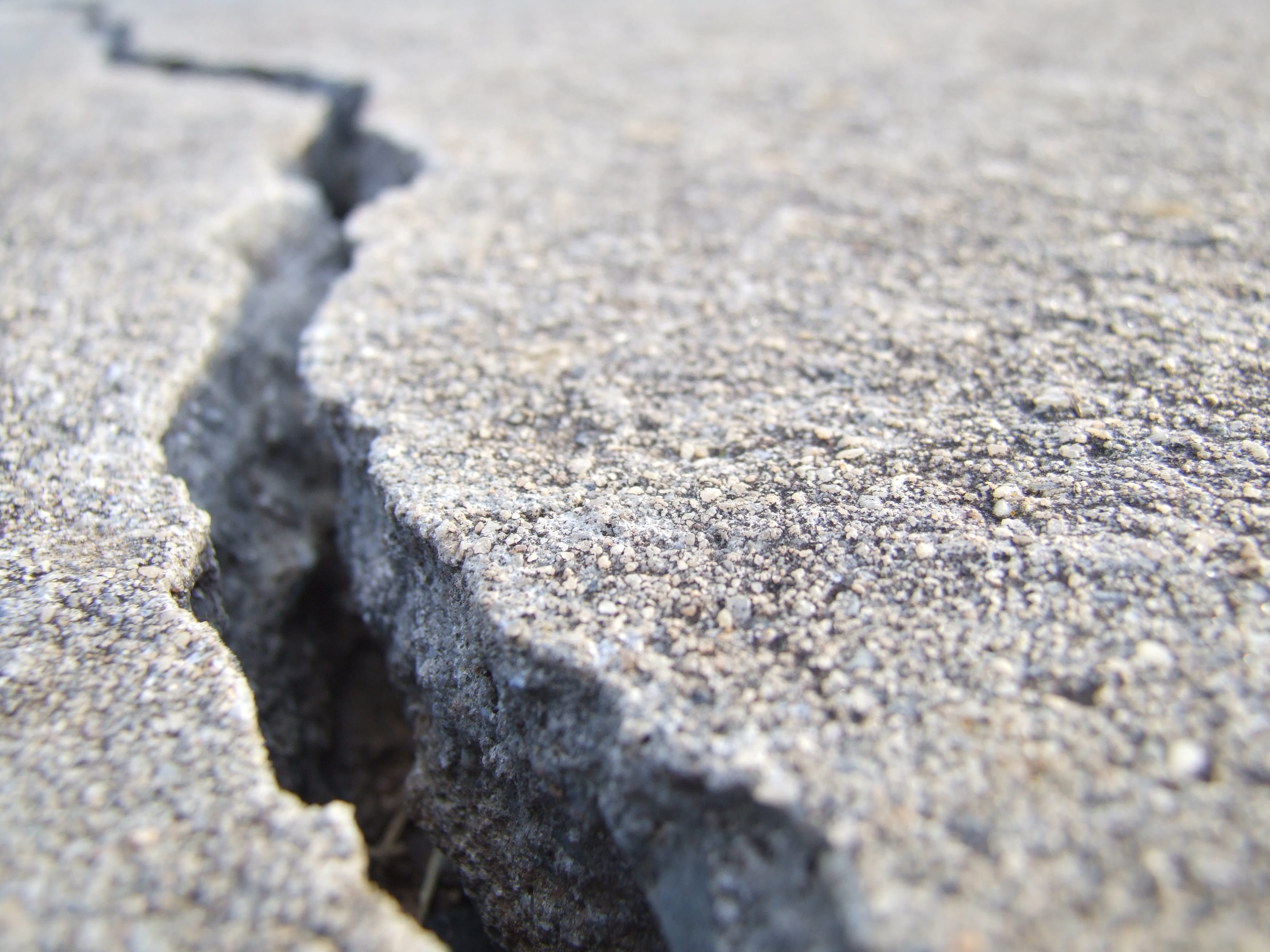 ground, grey, sidewalk, rough, broken, surface level, no people, full frame, gravel, break, sunlight, concrete, selective focus, outdoors, cracked, close-up, HD Wallpaper