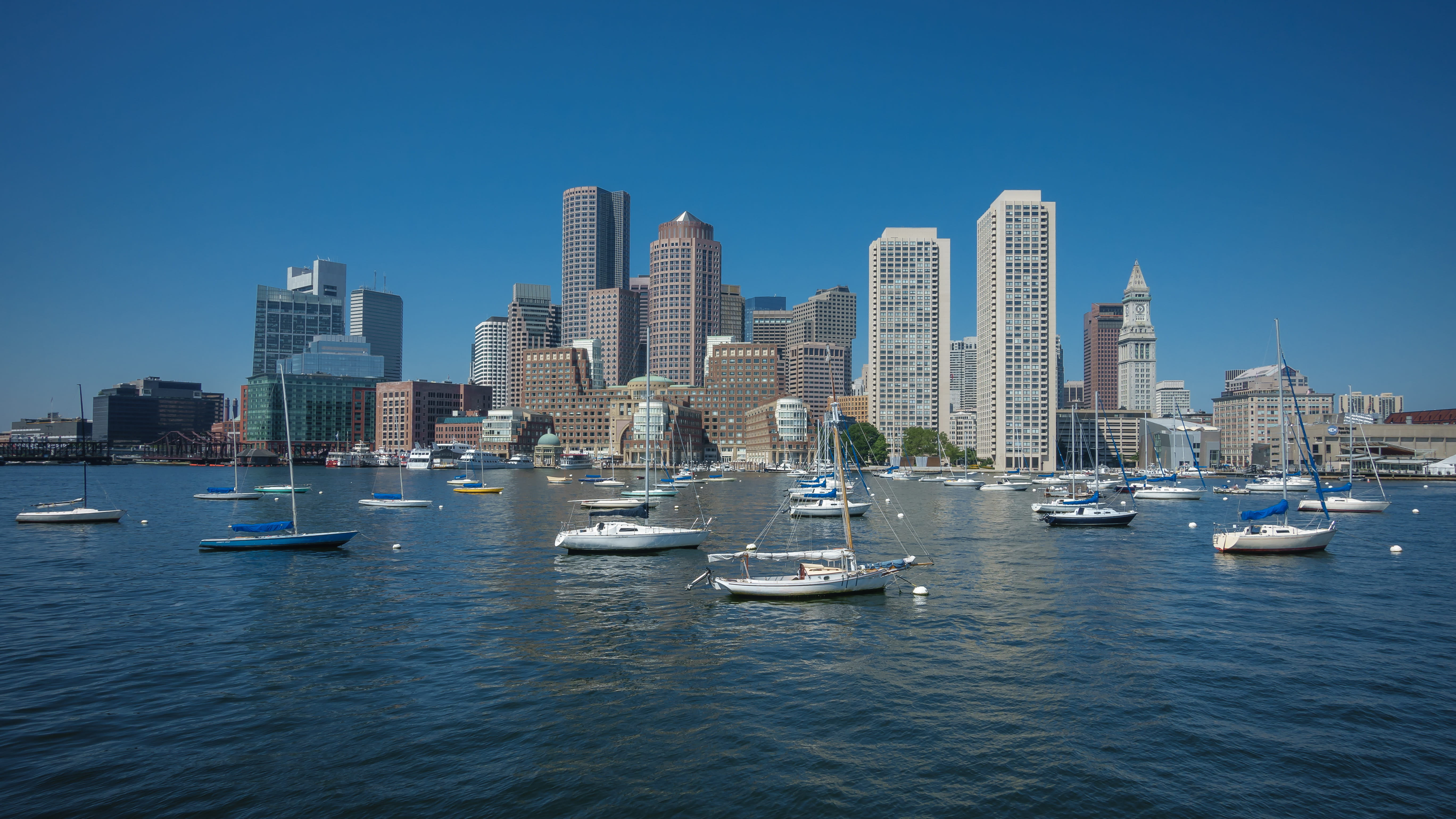skyscrapper, ocean, 5K, clear sky, building, passenger craft, mode of transportation, water, transportation, financial district, yacht, building exterior, HD Wallpaper