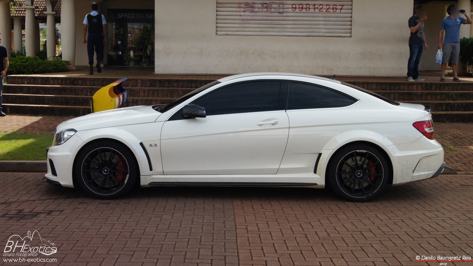 motor vehicle, Mercedes-Benz C63 AMG, city, side view, travel, real people, day, luxury, car, architecture, men, built structure, building exterior, footpath, HD Wallpaper