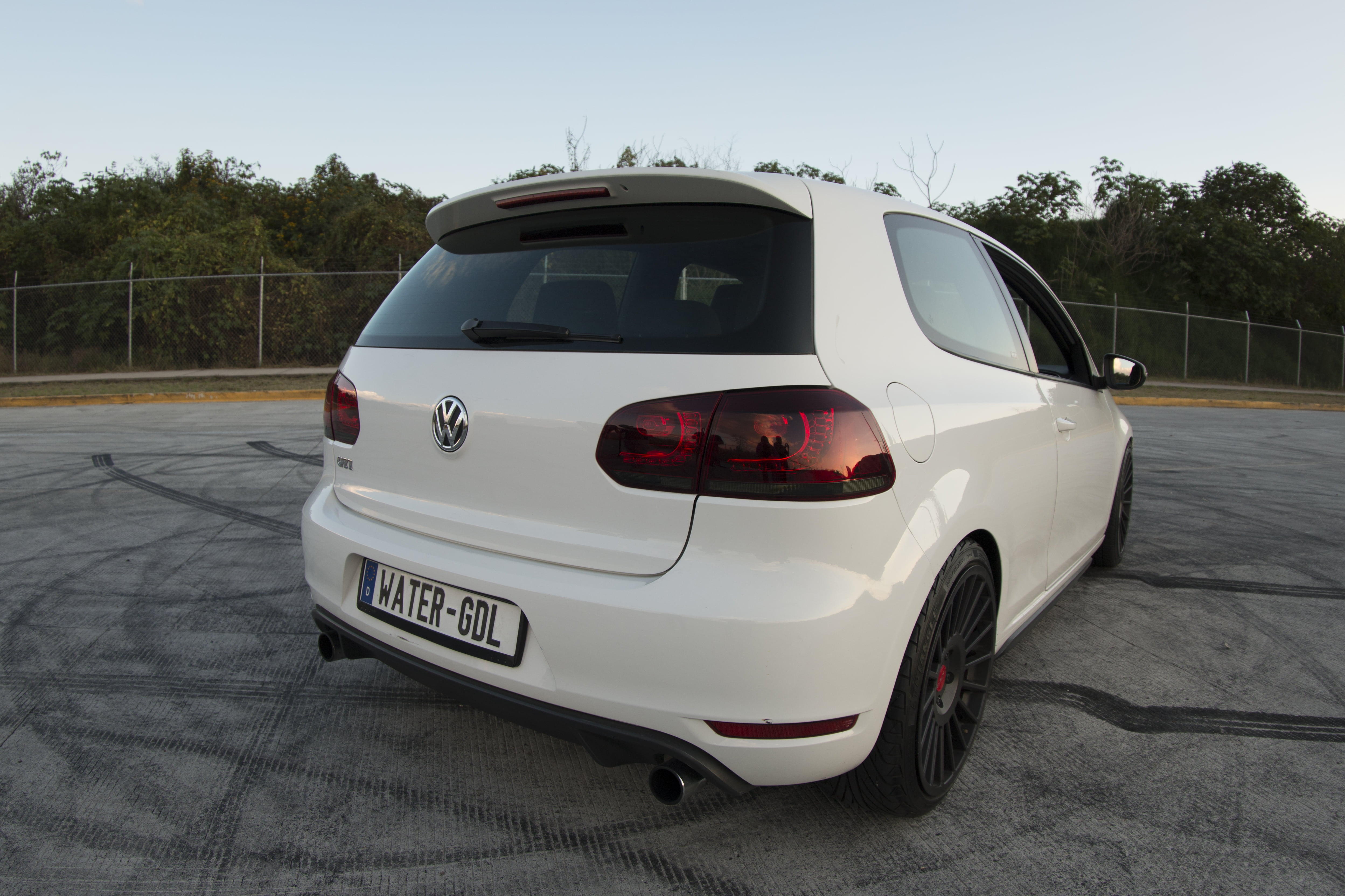 land vehicle, sky, stationary, motor vehicle, Mexico, road, AMG Black Series, tree, wheel, no people, speed, nature, city, travel, car, street, VW Golf 7 GTI, HD Wallpaper