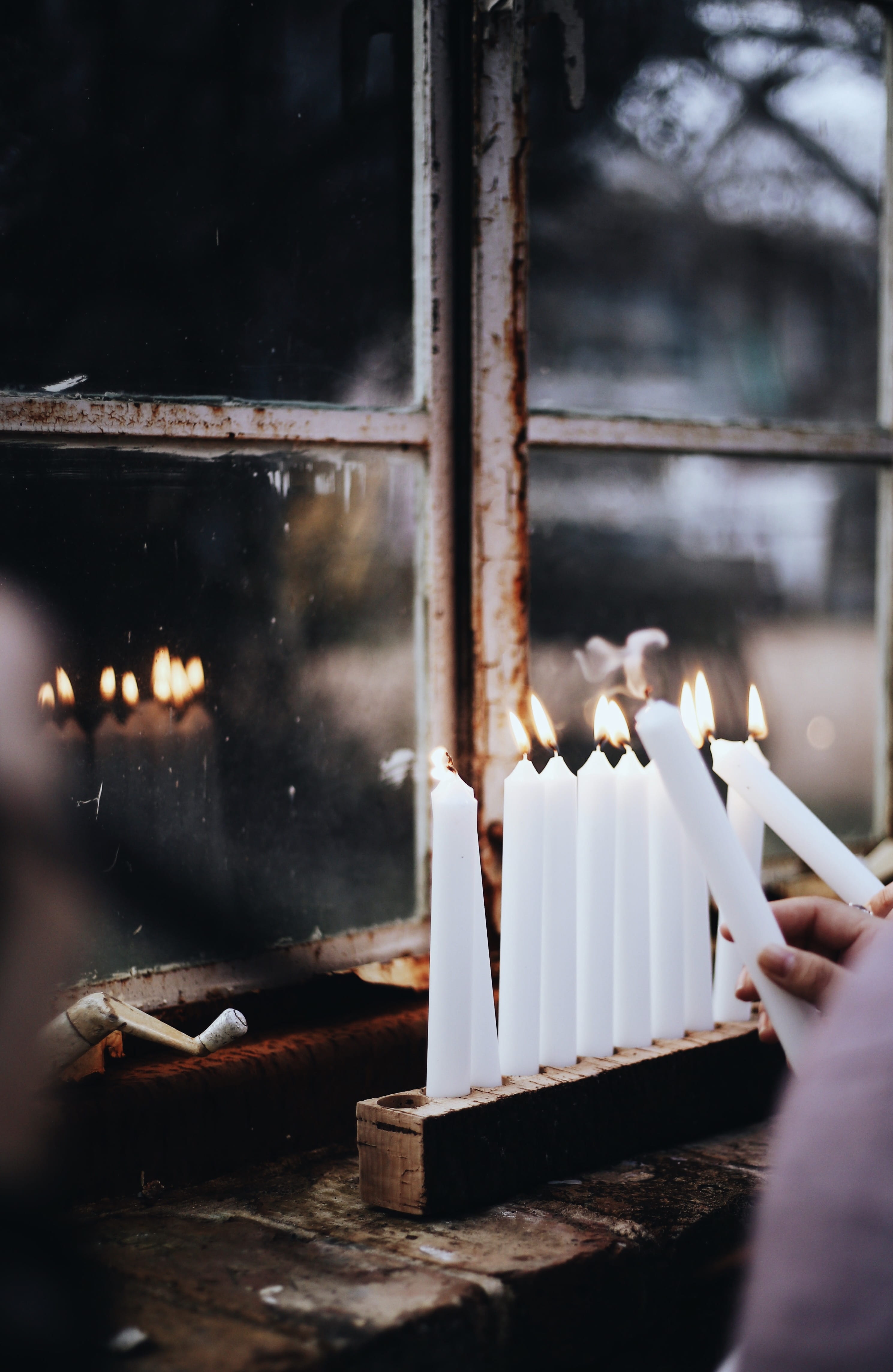 holding, finger, crystal, sitting, candlesticks, nature, built structure, human, one person, place of worship, vigil, white, heat - temperature, architecture, Phone HD Wallpaper