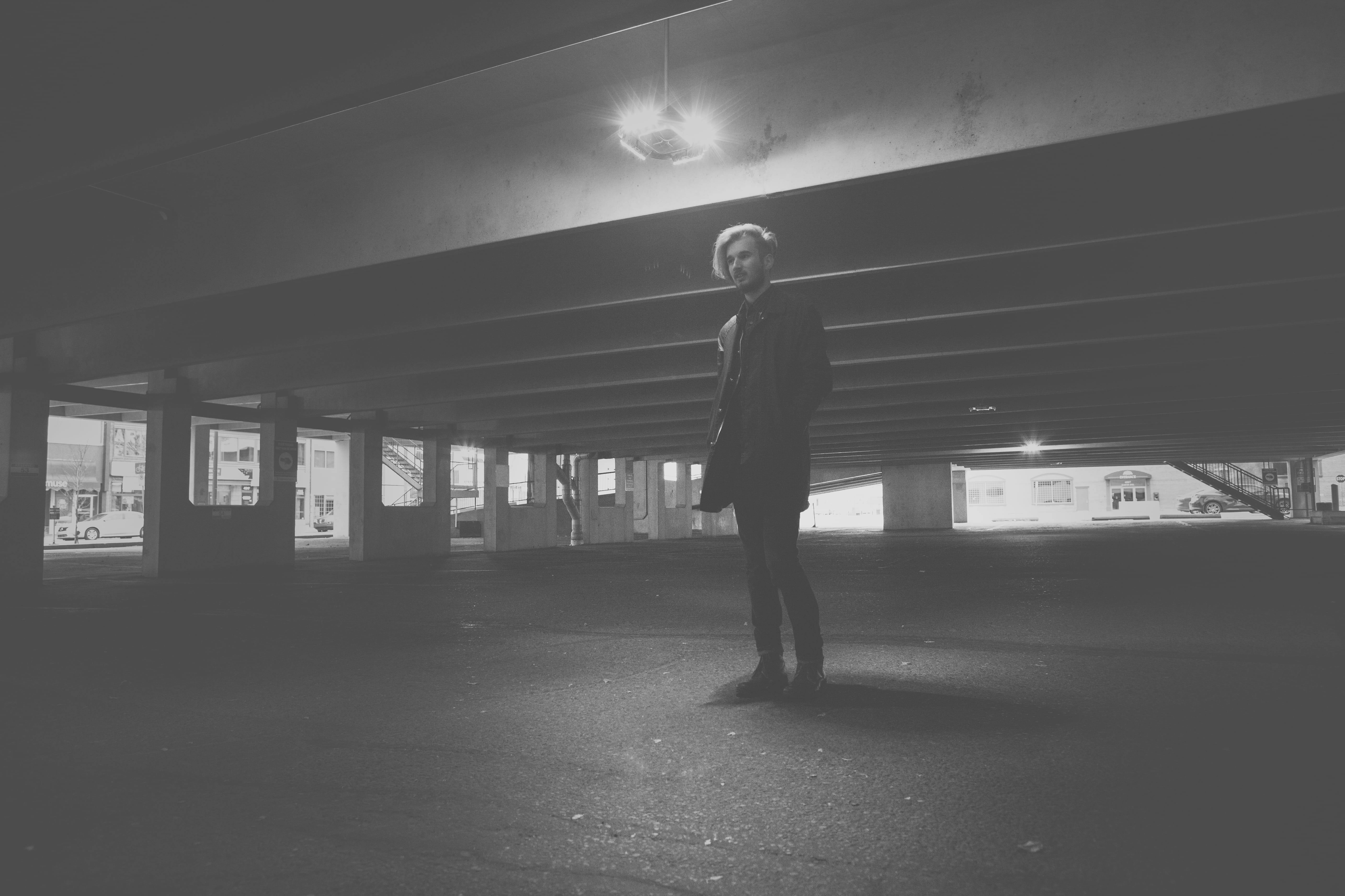 leisure activity, built structure, architecture, silhouette, guy, nightlife, 5K, men, full length, real people, parking lot, light, dusk, illuminated, HD Wallpaper