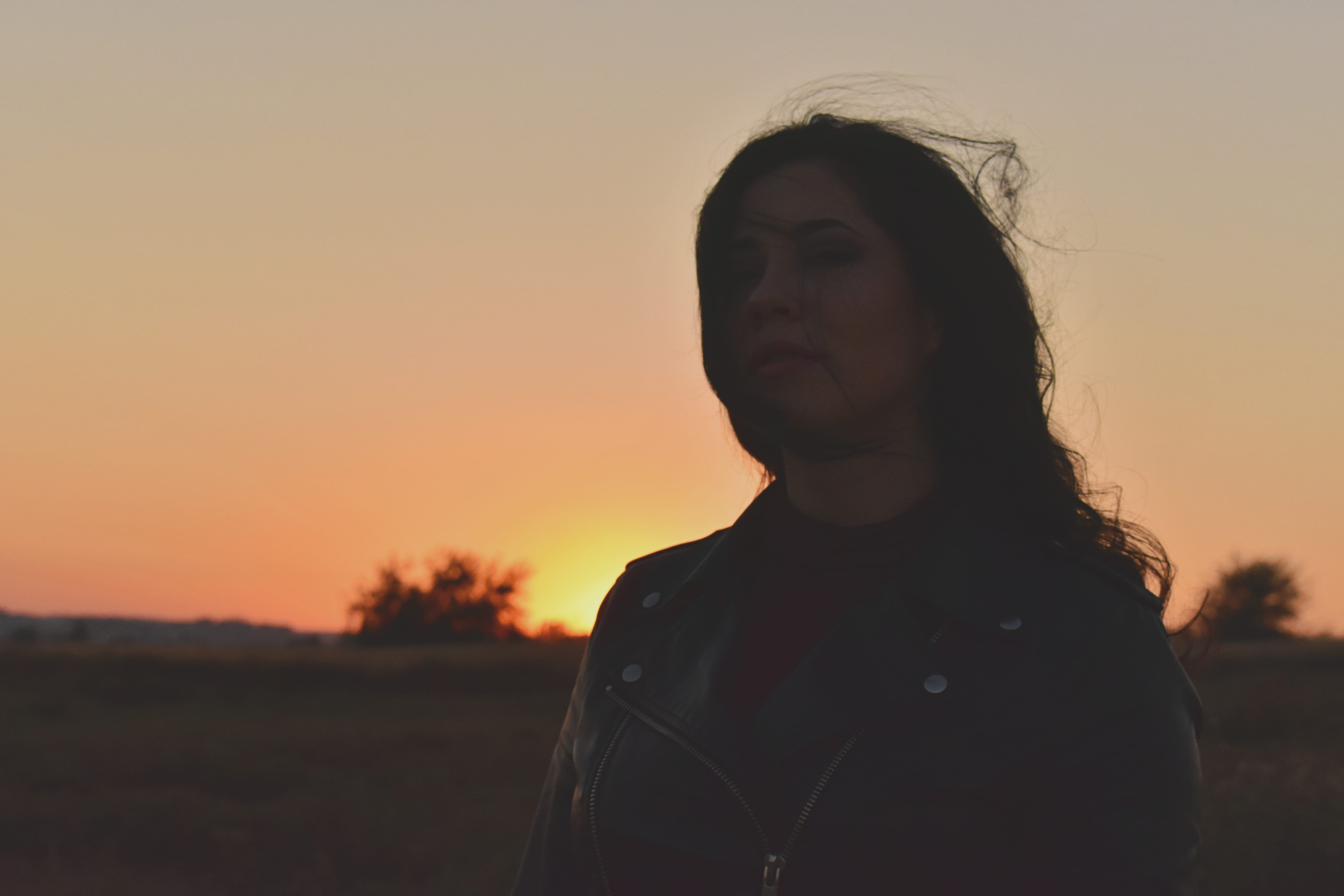 dawn, looking away, looking, orange color, hairstyle, evening, focus on foreground, woman, light, sky, young adult, golden, wearing, zip, real people, headshot, HD Wallpaper