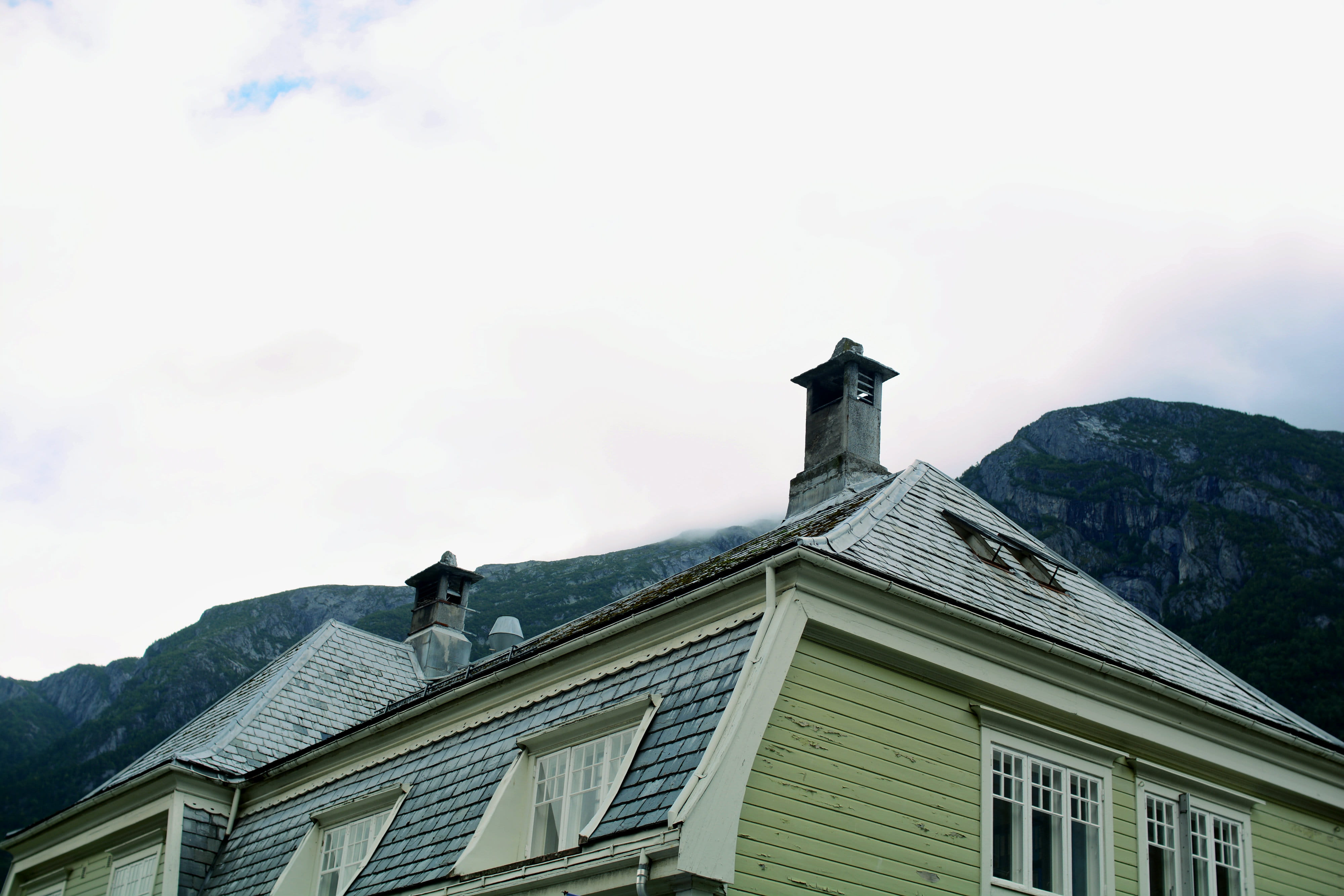 building, spire, the past, architecture, sky, rocky mountain, outdoors, nature, cloudy, roof, mountain, rocky, yellow, near, built structure, religion, HD Wallpaper