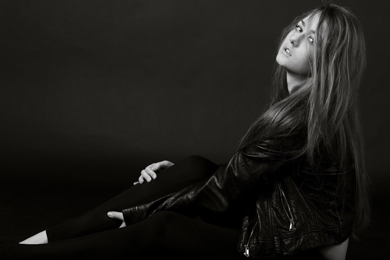 monochrome, jacket, straight hair, long hair, leather jackets, women, sitting, 720P, black jackets, Ingrid Olerinskaya, open mouth, black pants, hair in face, HD Wallpaper