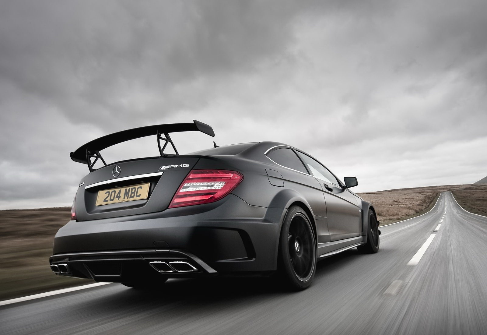 car, auto racing, nature, cloud - sky, amg, on the move, mercedes-benz, transportation, land vehicle, day, tire, speed, black, coupe, motor vehicle, road trip, HD Wallpaper