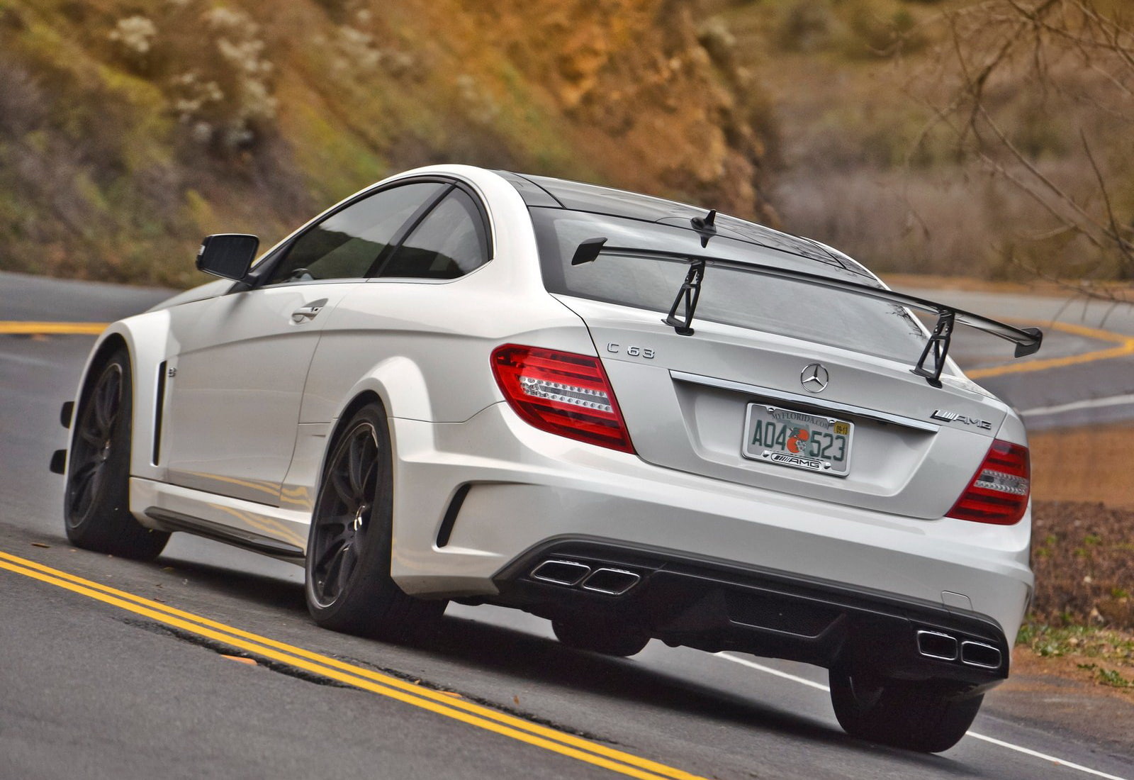 c63, motor vehicle, black, red, focus on foreground, on the move, mercedes-benz, outdoors, retro styled, land vehicle, motion, transportation, travel, car, HD Wallpaper