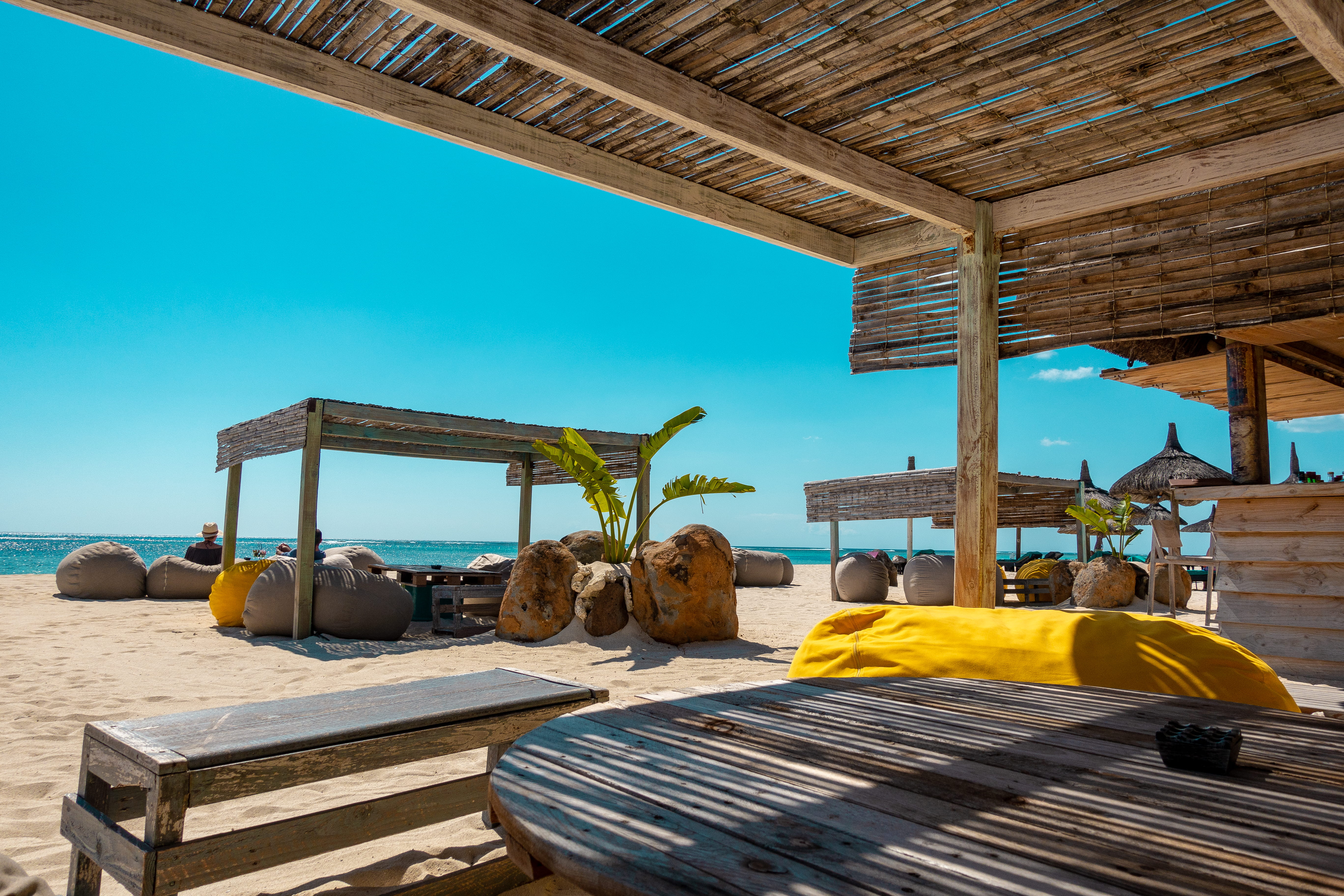architecture, straw, table, day, nature, seat, water, sunset, ceiling, wood - material, beauty in nature, beach, blue, no people, dinarobin beachcomber golf resort and spa, HD Wallpaper