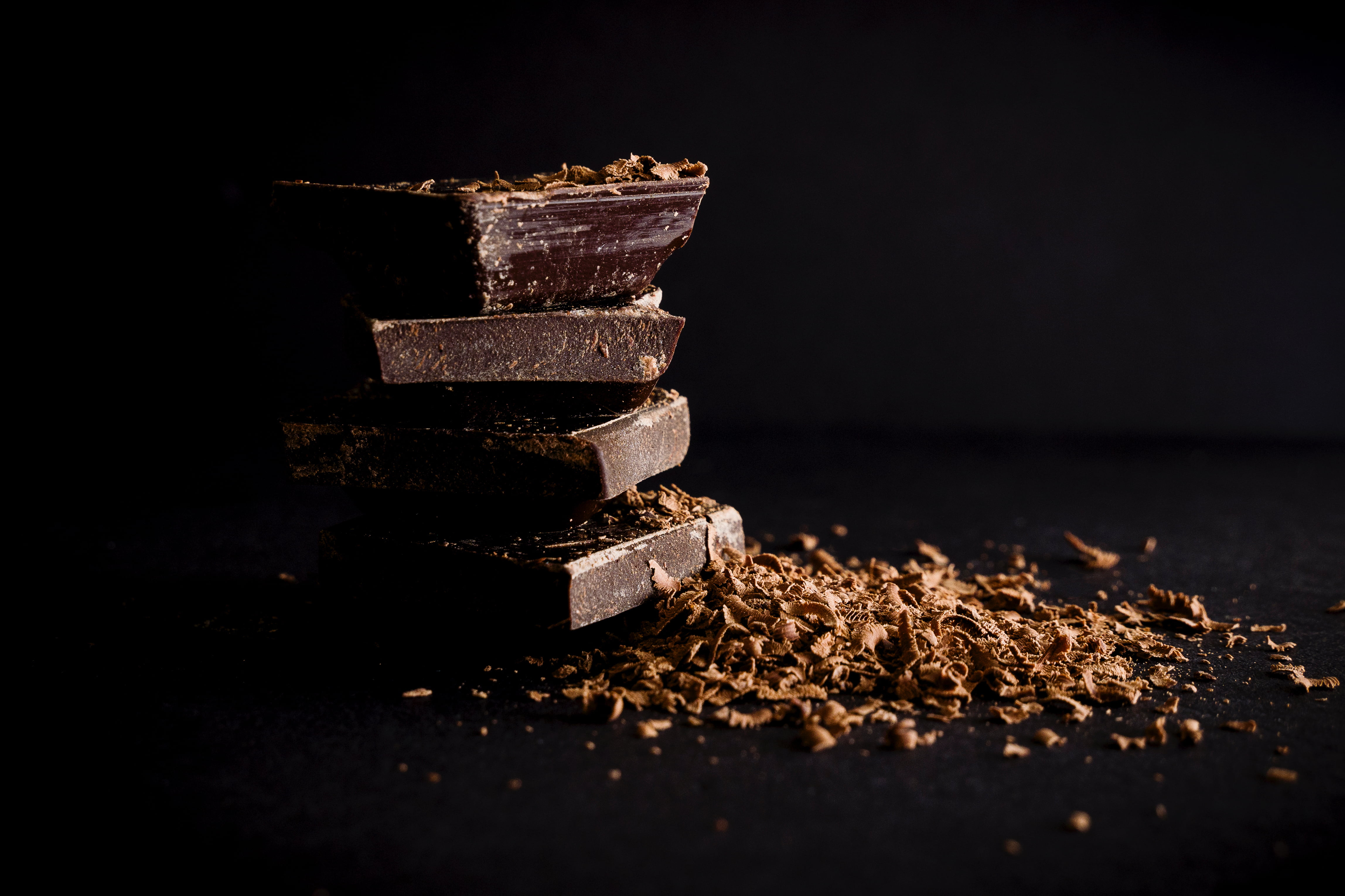 food, close-up, wood - material, sweet Food, chocolate, old, stack, still life, dessert, selective focus, 4K, black background, freshness, brown, copy space, HD Wallpaper