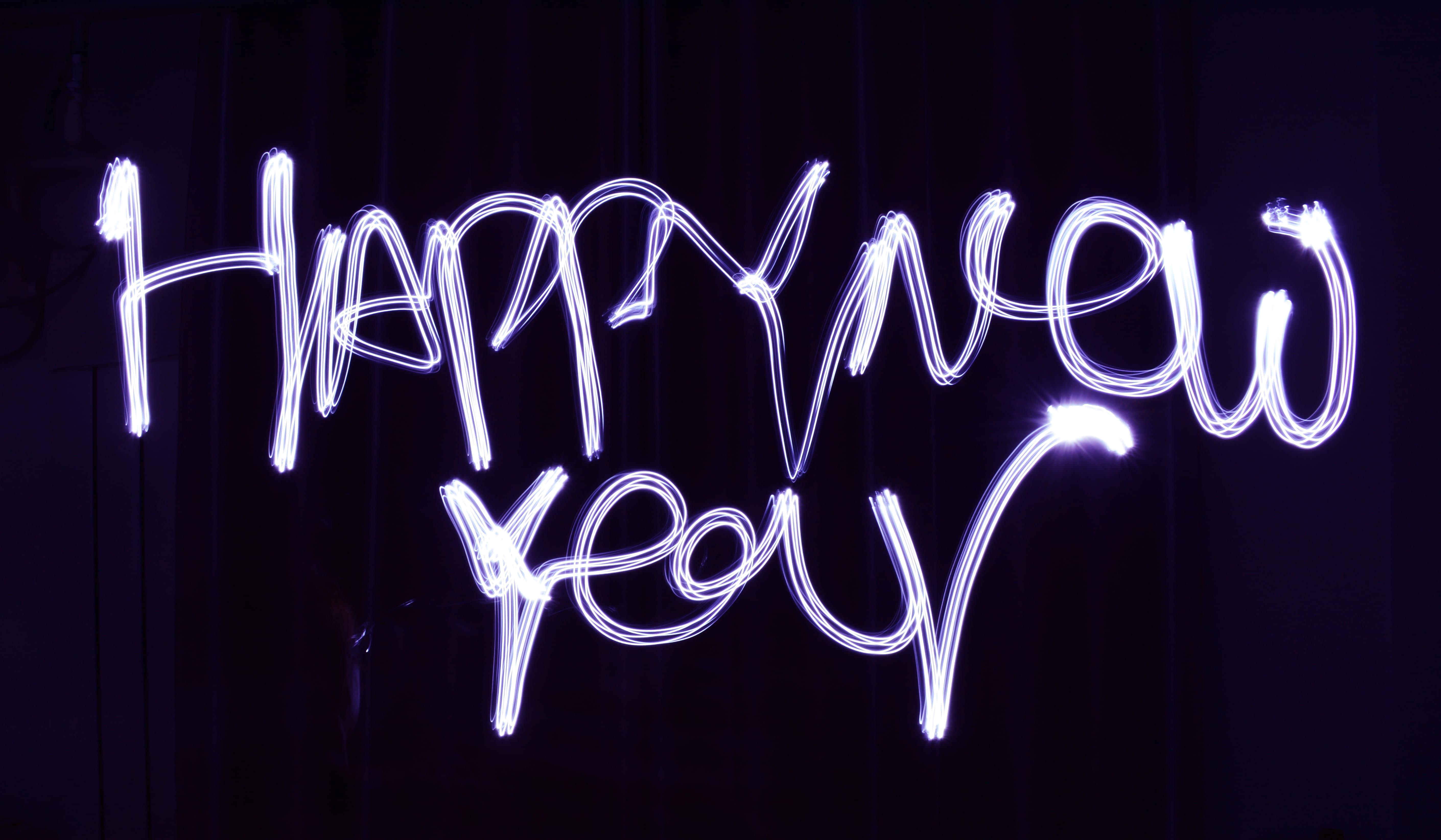 new, long exposure, night, illuminated, no people, 5K, lighting equipment, nightlife, studio shot, black background, single word, message, year, motion, HD Wallpaper