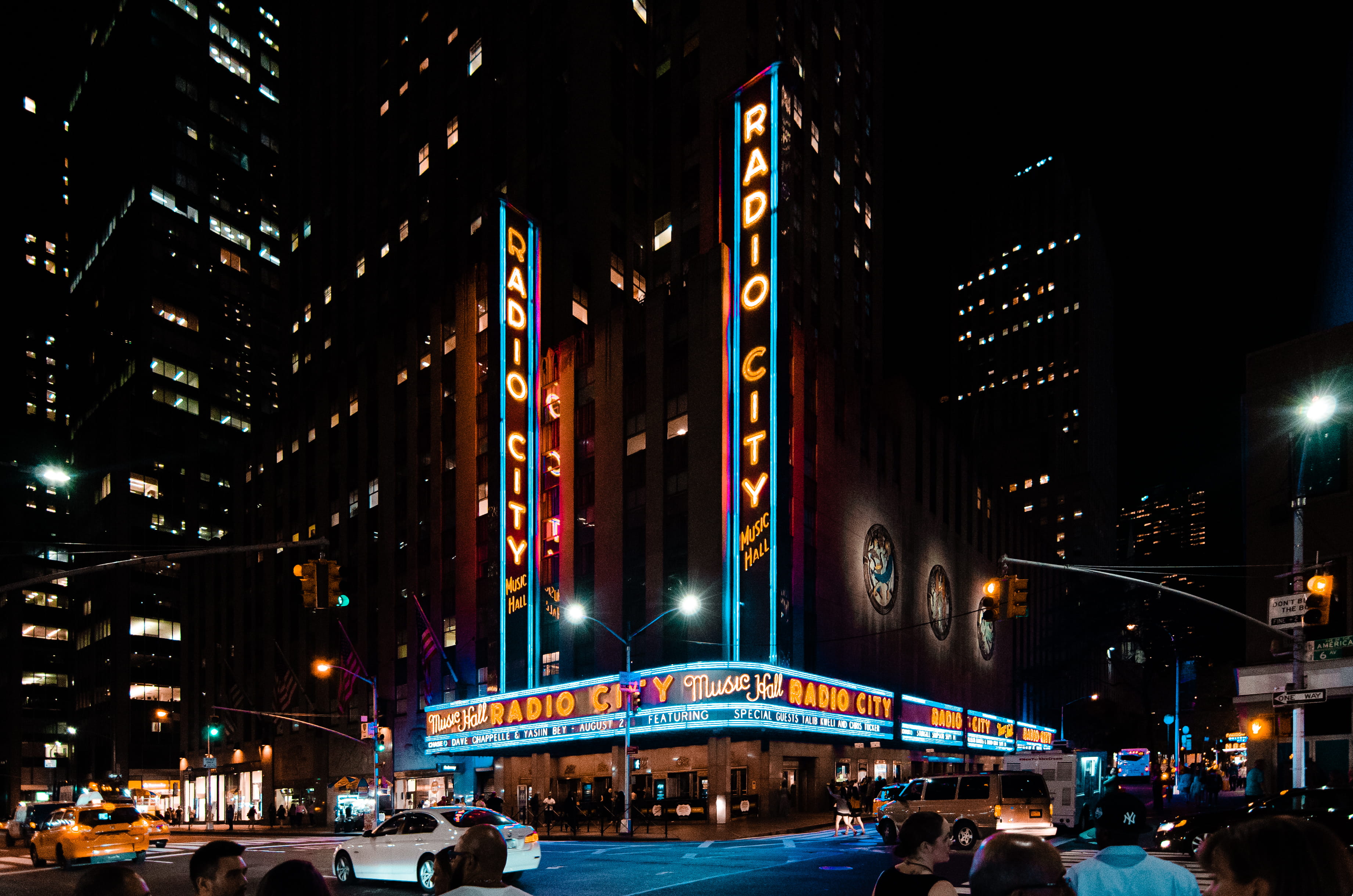 city life, light, radio city, car, new york, incidental people, office building exterior, street light, text, built structure, mode of transportation, skyscraper, HD Wallpaper