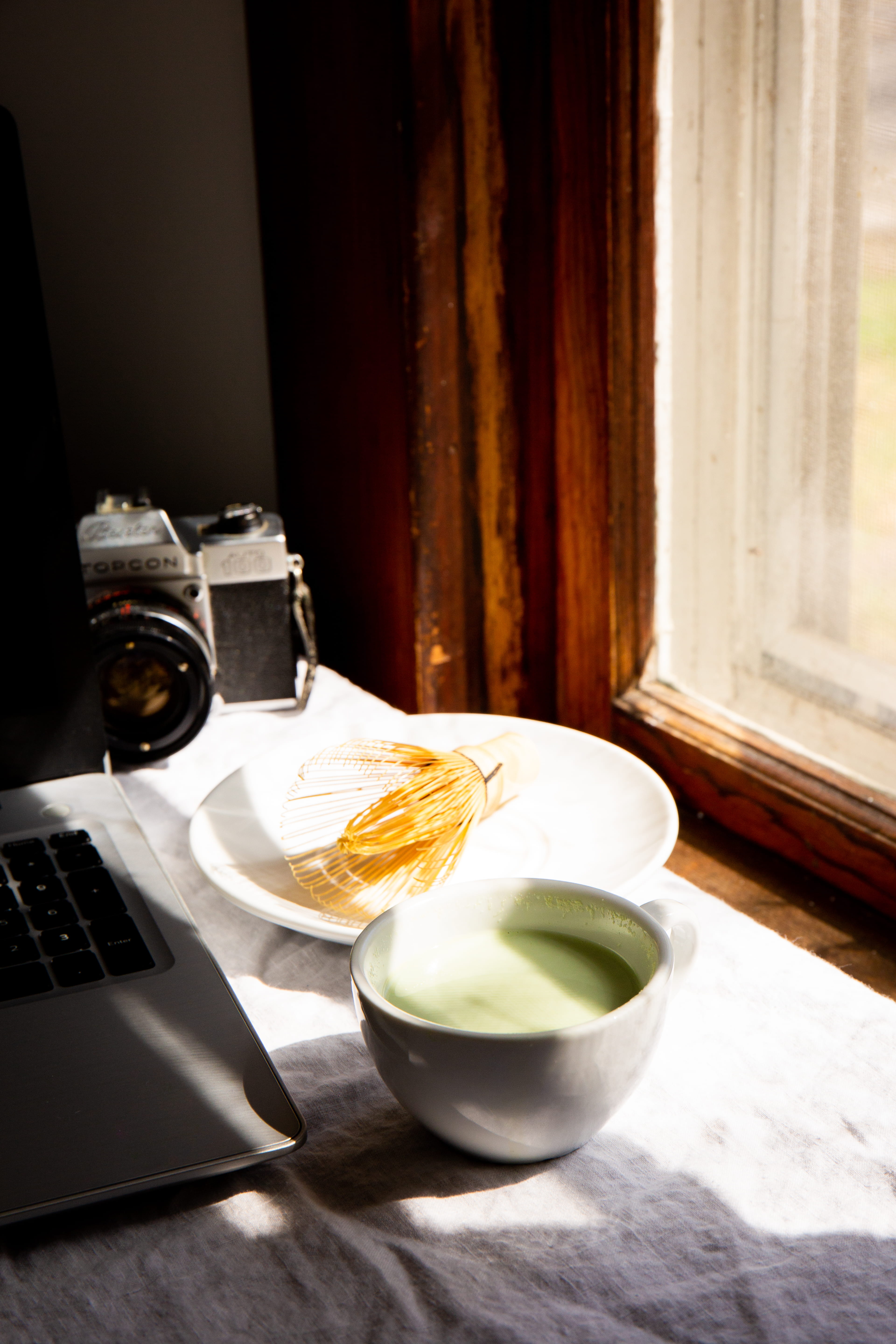 beside, camera, food and drink, white, technology, morning, 5K, filled, drink, still life, green tea, chase studio co, 35mm camera, computer, film camera, Phone HD Wallpaper
