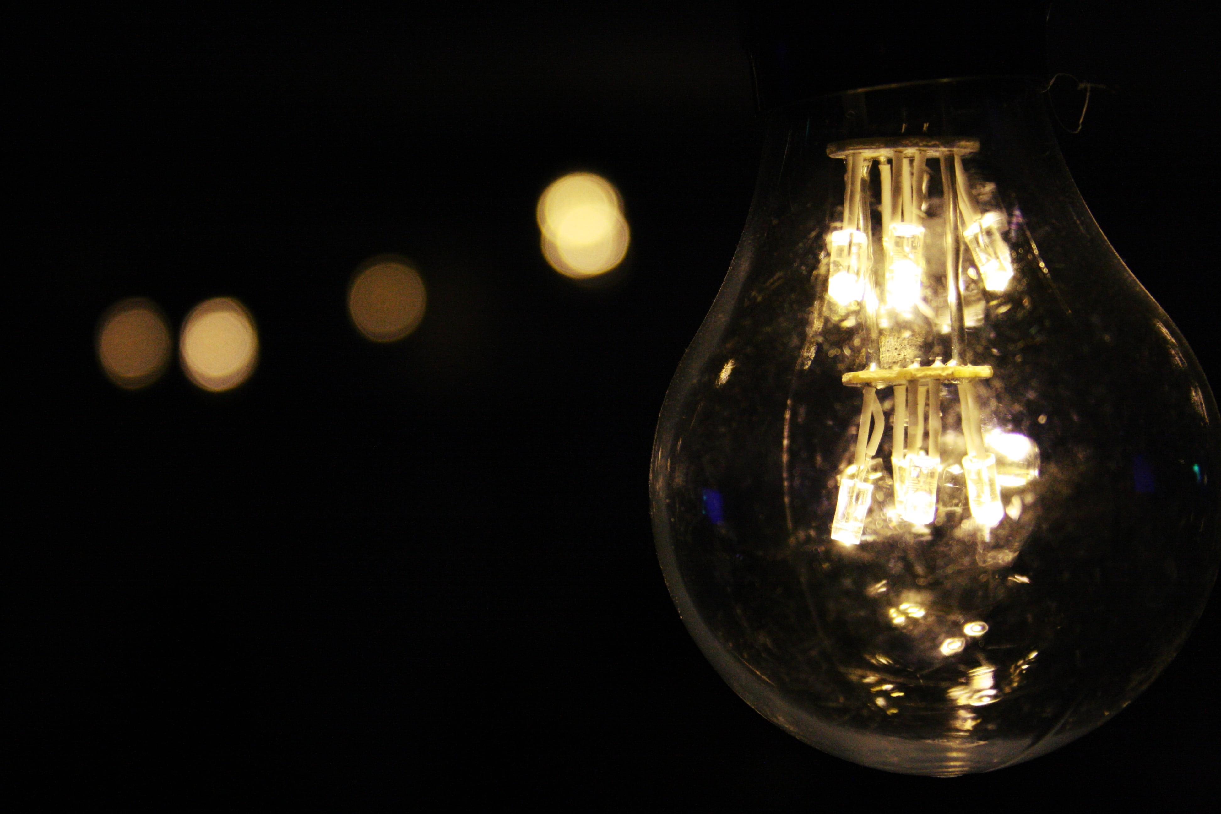 indoors, copy space, glass - material, electric lamp, technology, transparent, black background, night, light - natural phenomenon, hanging, dark, bulb, HD Wallpaper