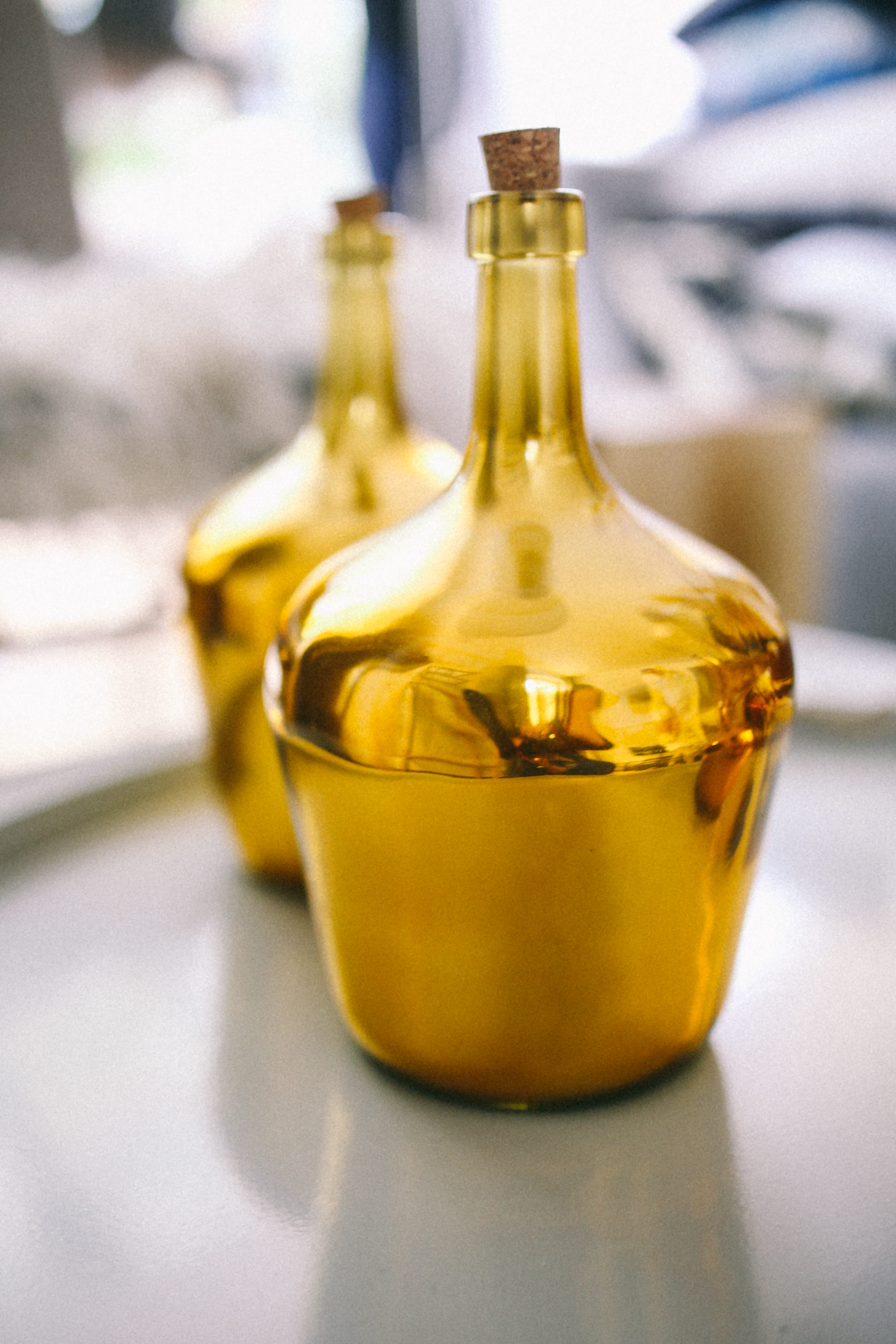 decorations, transparent, table, accesories, accessories, no People, drink, decor, fossil fuel, home, olive Oil, focus on foreground, 5K, scandi, yellow, Phone HD Wallpaper