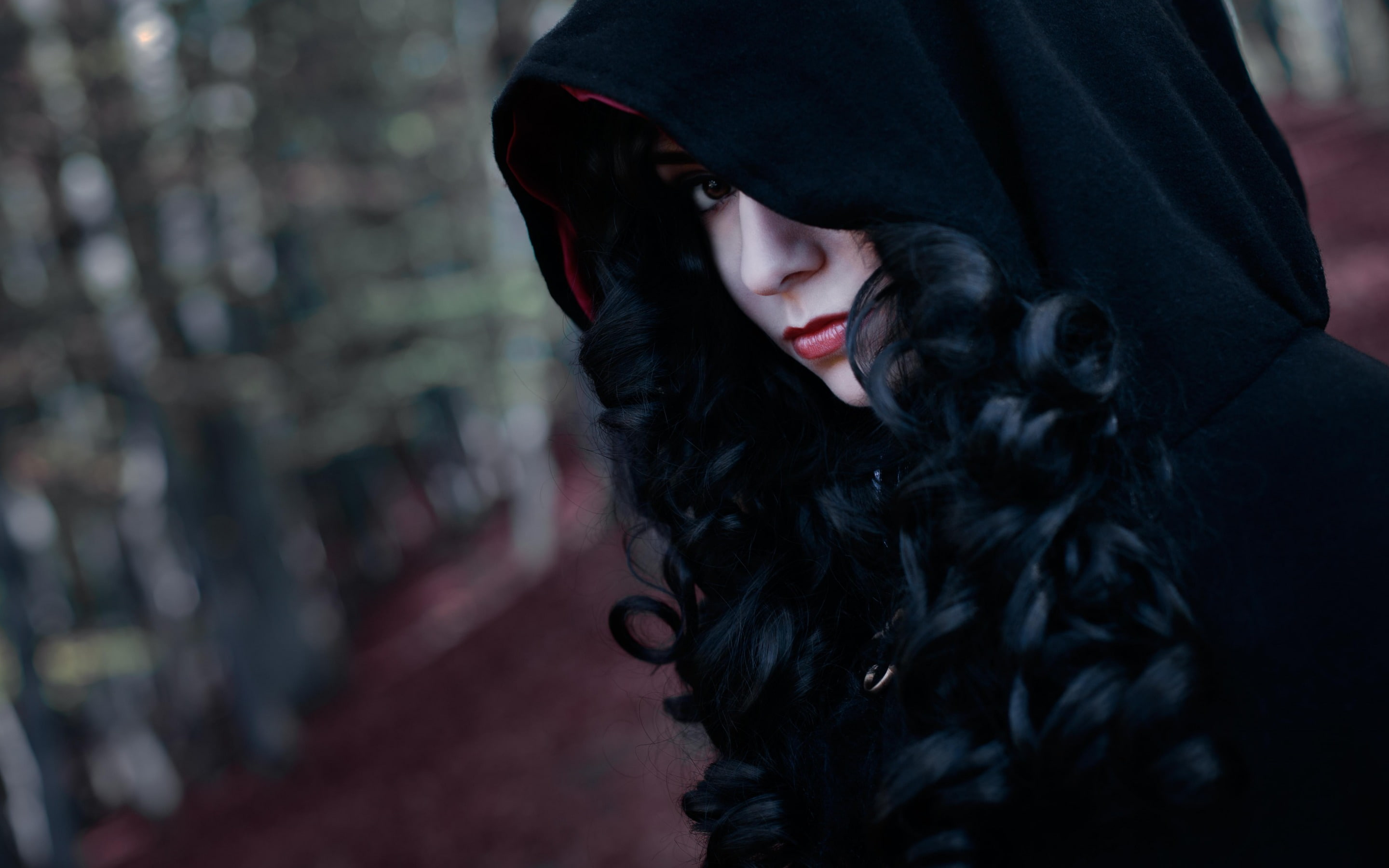 face, black dress, cosplay, The Witcher, black hair, depth of field, 2K, Yennefer, women, model, women outdoors, curly hair, hoods, long hair, looking at viewer, HD Wallpaper