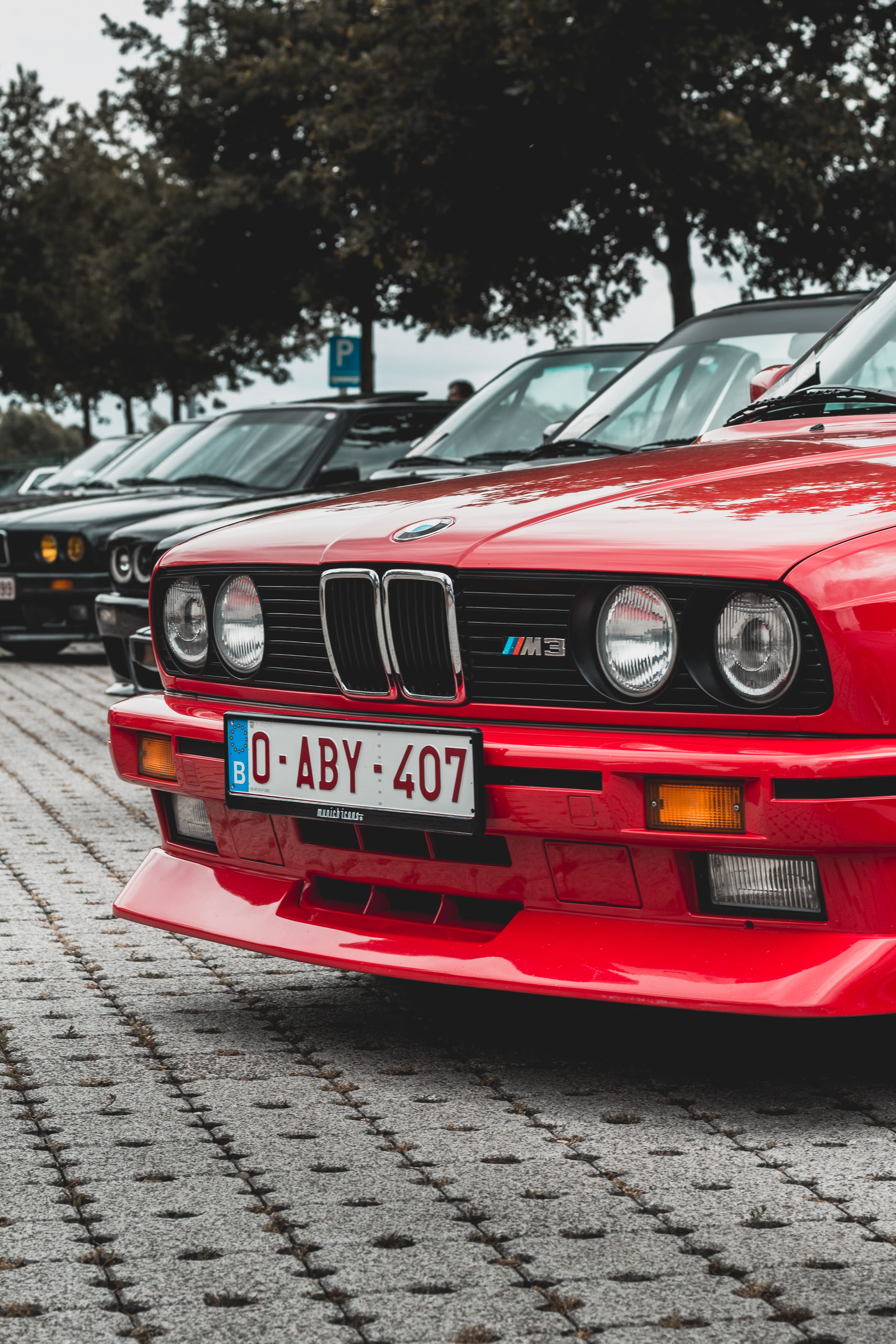 light, bmw, day, automobile, car, tire, race car, stationary, headlight, land vehicle, street, vehicle, person, license plate, red, machine, sports car, Phone HD Wallpaper