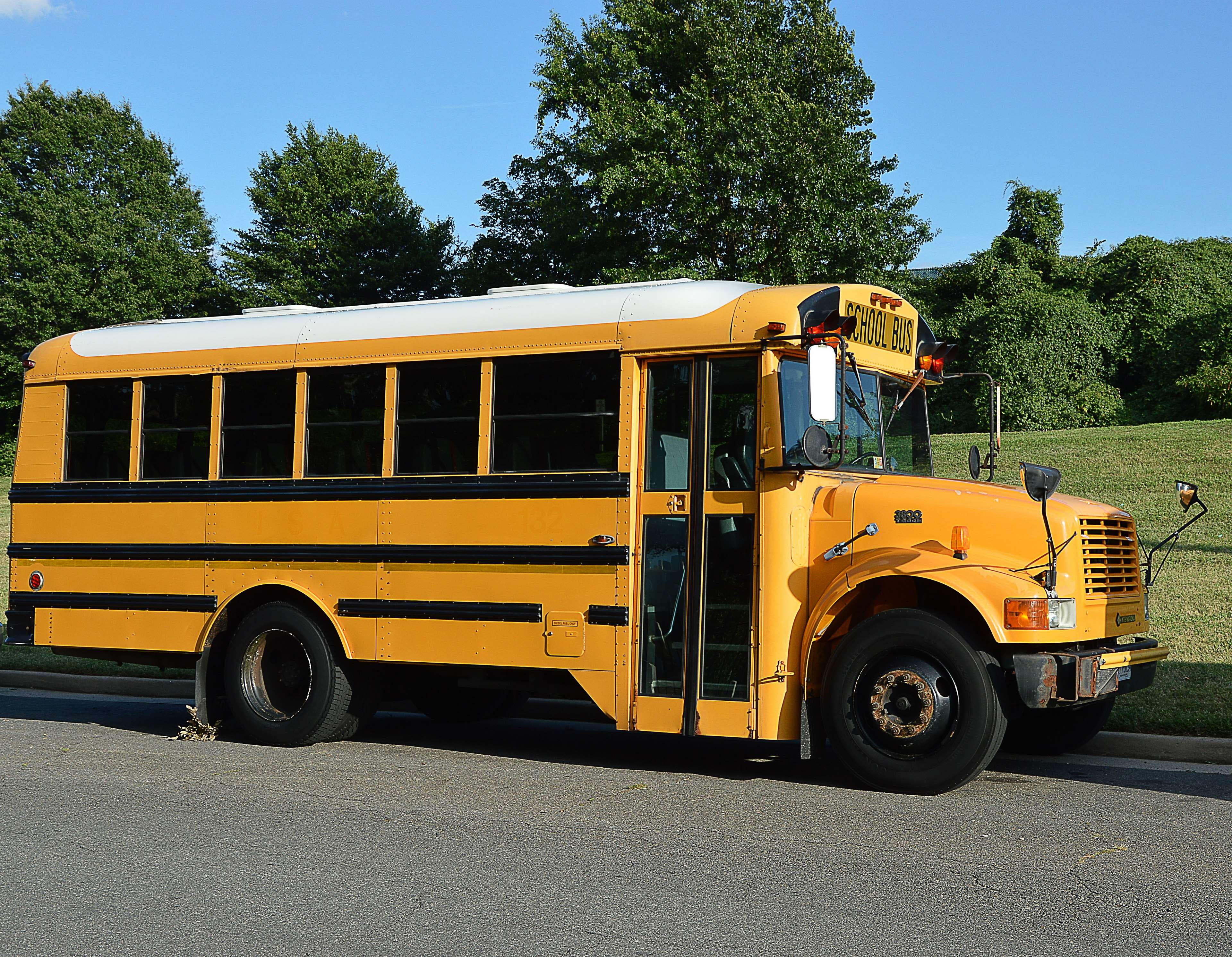 america, shadow, transportation, street, motor vehicle, outdoors, tree, wheel, day, no people, stationary, 4K, sunlight, public transportation, bus, plant, HD Wallpaper
