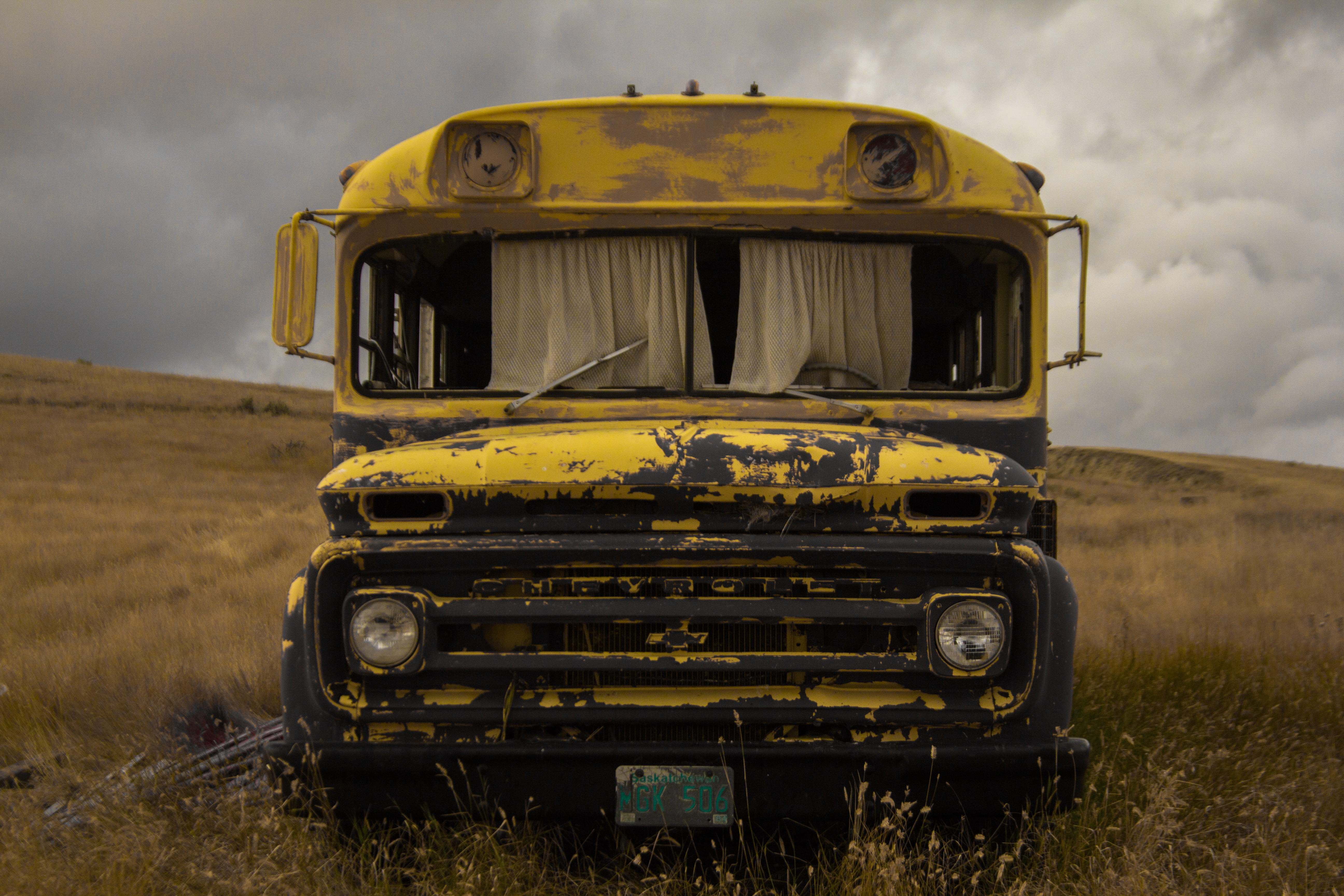 bumper, cloud, transportation, travel, wreck, abandoned, 5K, daytime, day, fender, clouds, cloud - sky, school bus, land vehicle, hillside, front view, HD Wallpaper