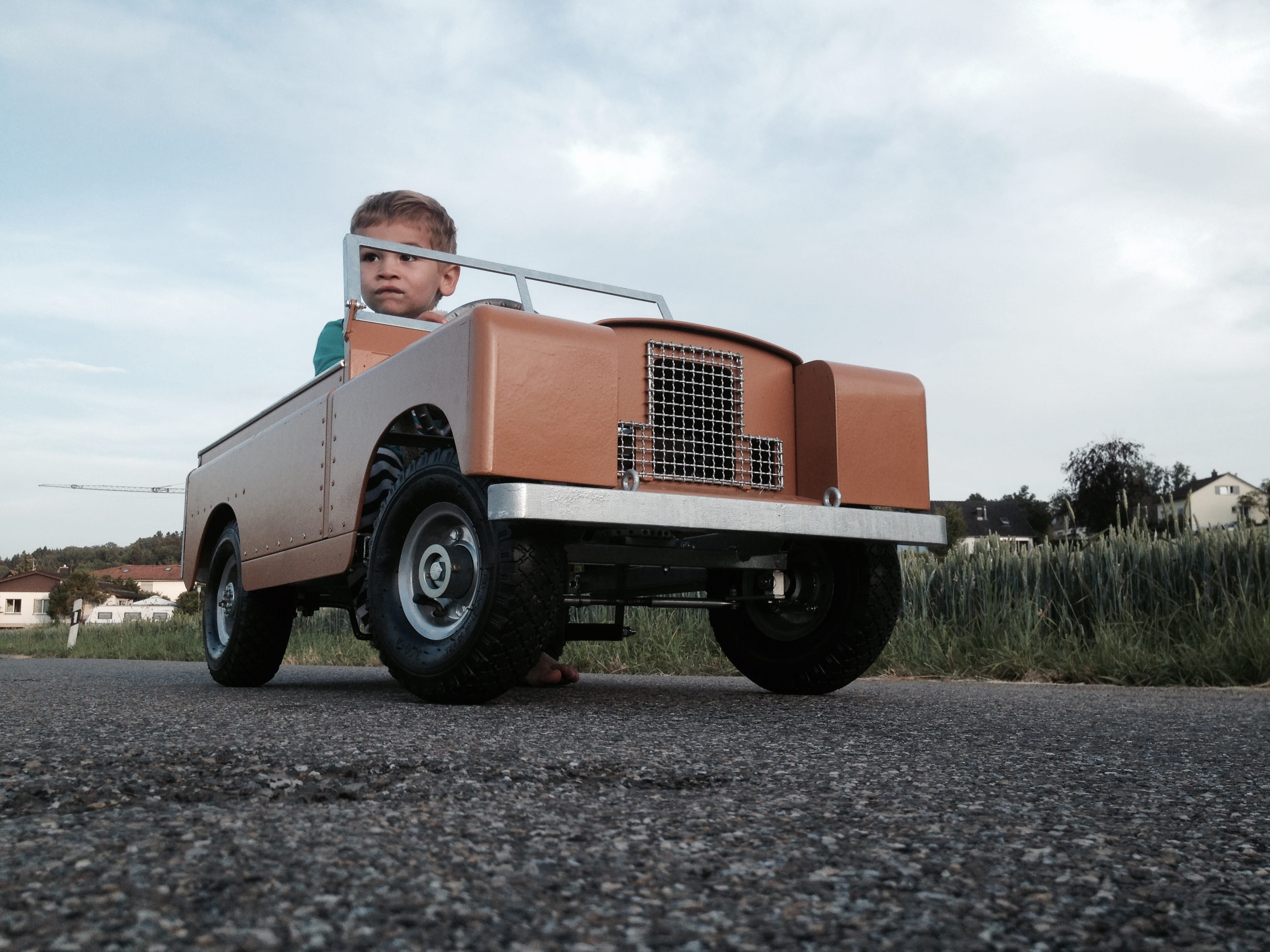 outdoor, one man only, Safari, 2K, Adventure, trucking, motor vehicle, toy, land vehicle, day, three cheese high, boys, front view, males, child, only men, HD Wallpaper