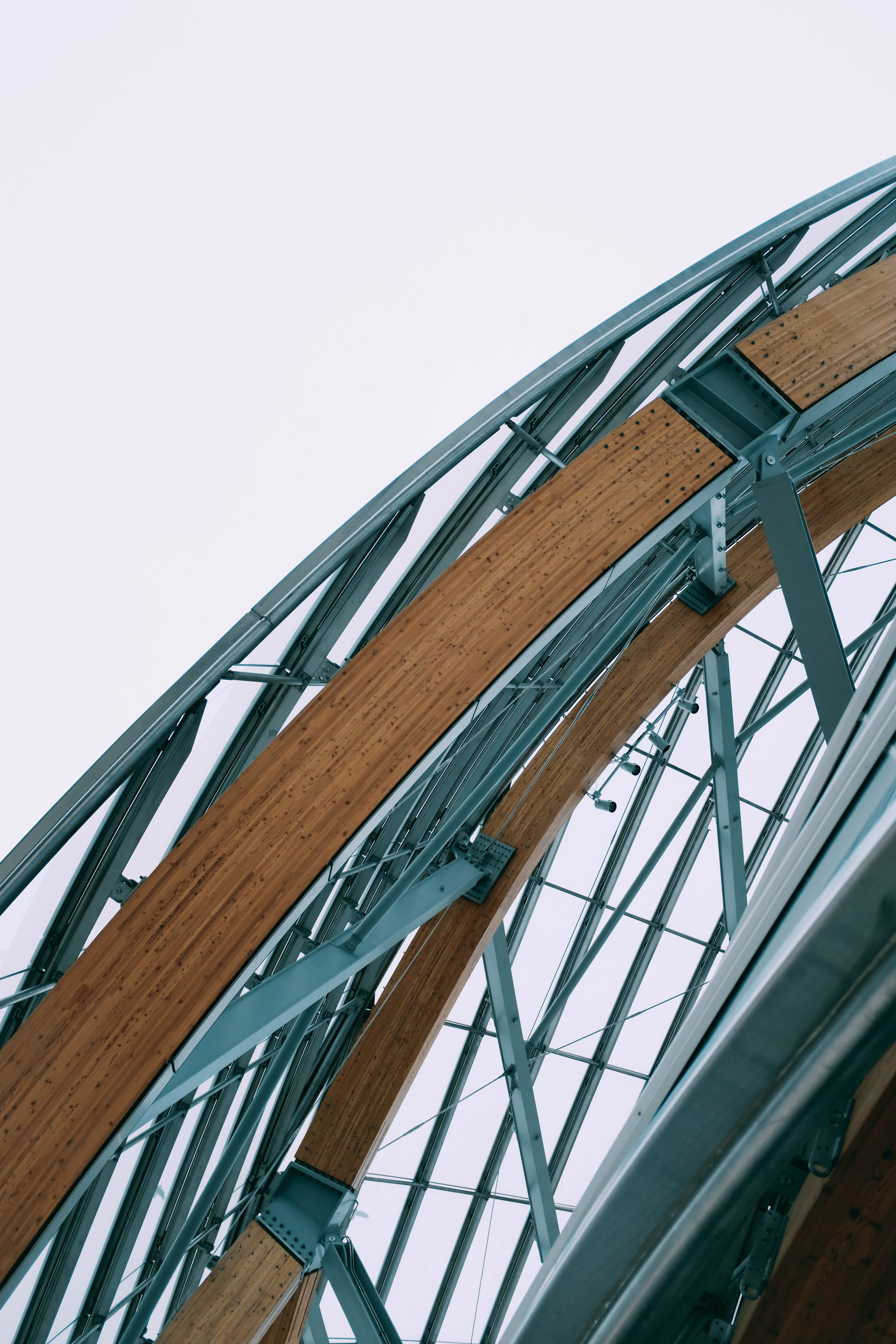 no people, roller coaster, metropolis, day, urban, window, directly below, arched, metal, opera house, building, clear sky, low angle view, glass - material, Phone HD Wallpaper