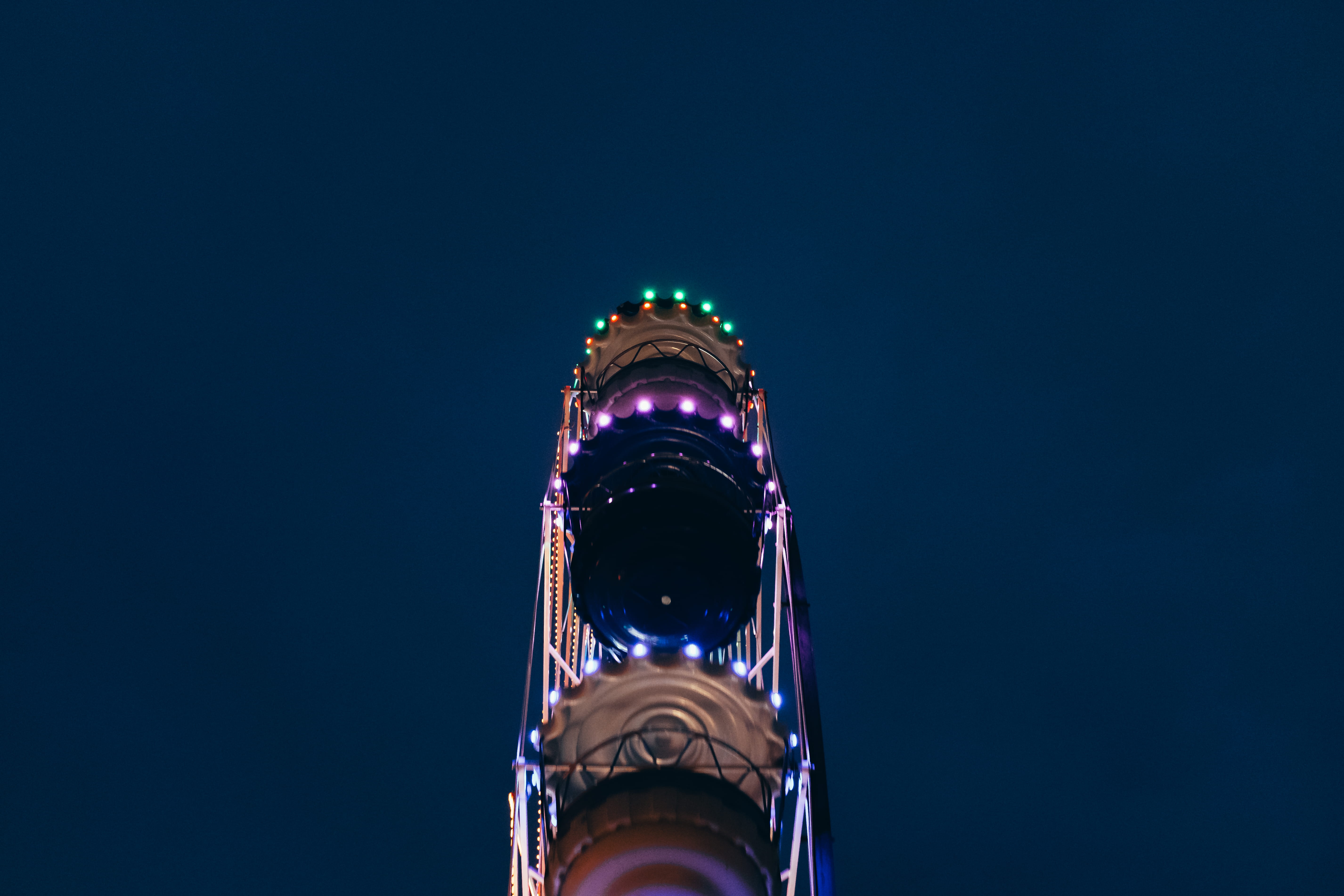 ferris whell, low angle view, wheel, city, illuminated, travel, blue background, 5K, night, building exterior, minimal, nature, ferris, no people, tourism, HD Wallpaper