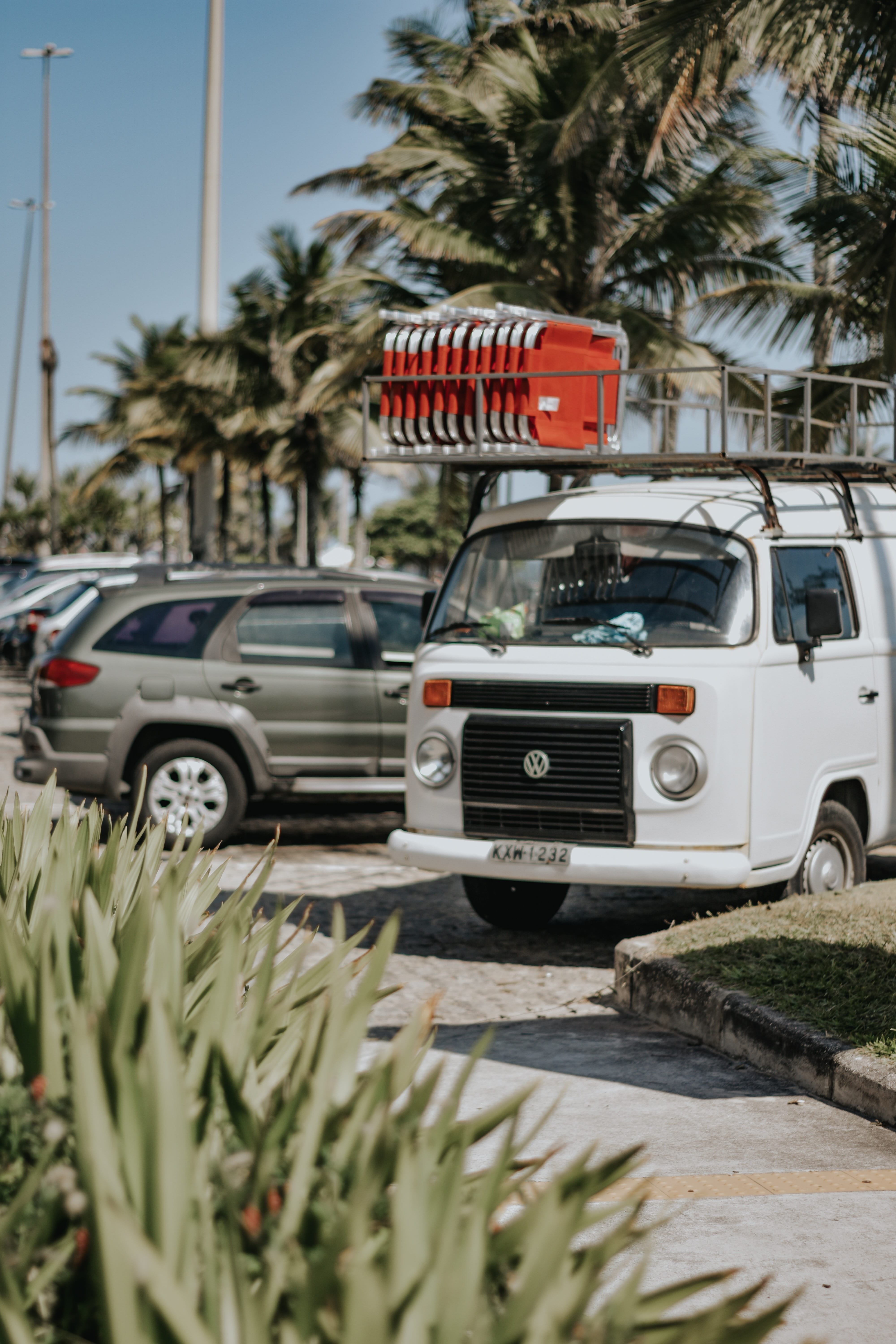 motor vehicle, vintage, parked cars, parking lot, coconut trees, day, photo, tree, no people, focus, classic, communication, city, transportation system, Phone HD Wallpaper