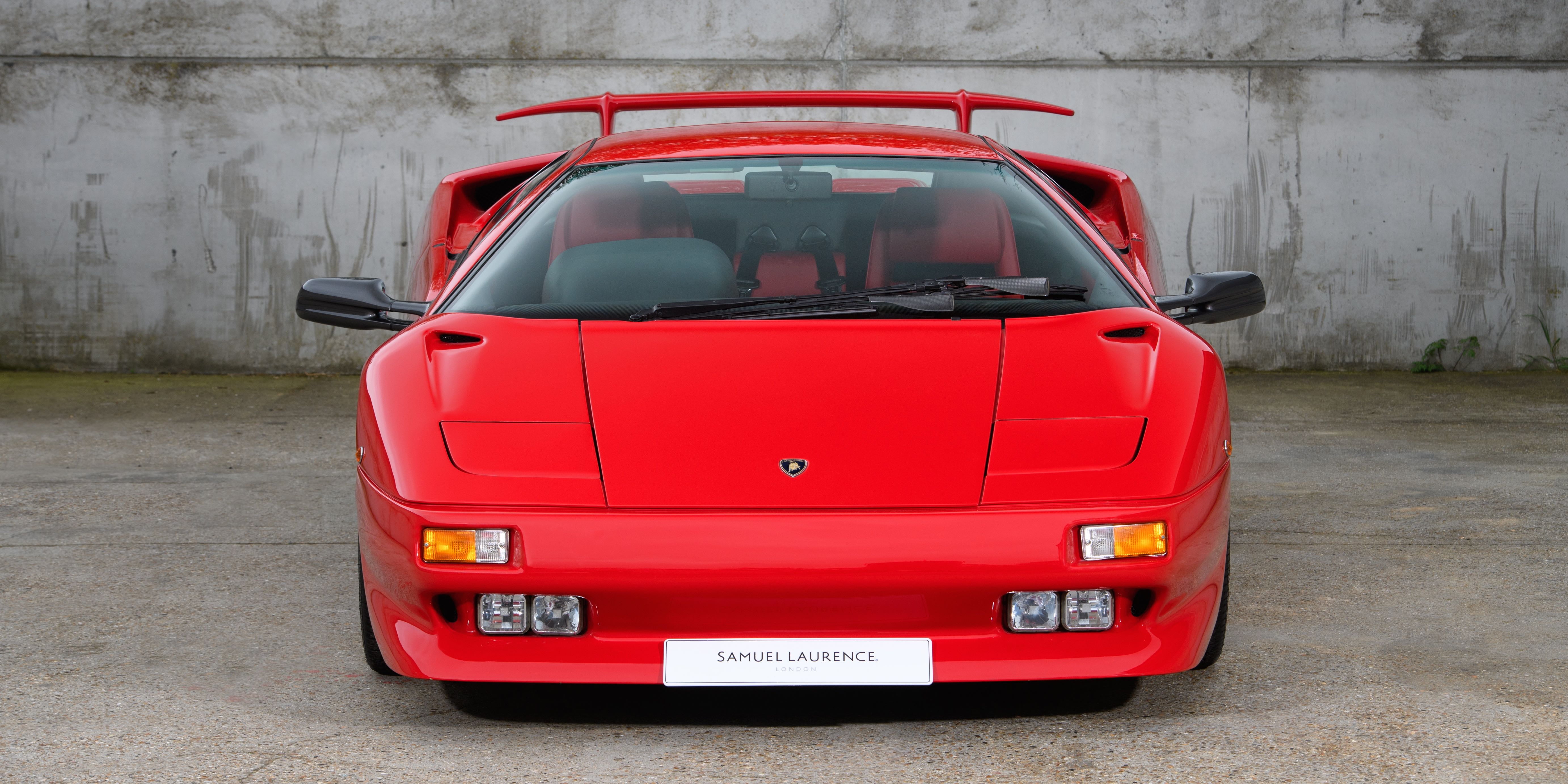 wall - building feature, red cars, motor vehicle, Lamborghini Diablo, outdoors, no people, front view, van - vehicle, stationary, city, red, mode of transportation, HD Wallpaper