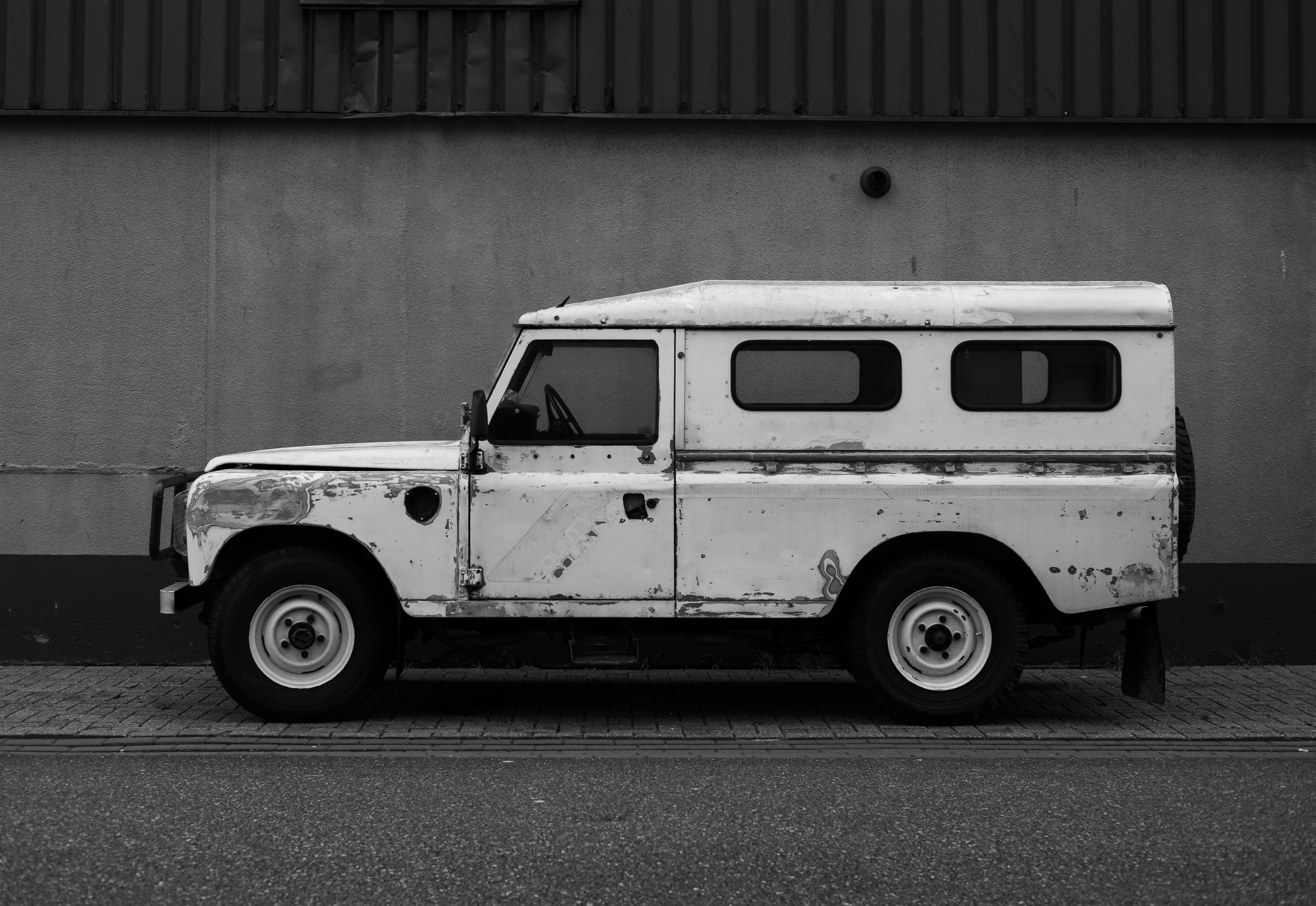 tarmac, street, bus, asphalt, wall, vehicle, wheel, alloy wheel, ambulance, machine, white, parked, handrail, stationary, parking, day, transportation, HD Wallpaper