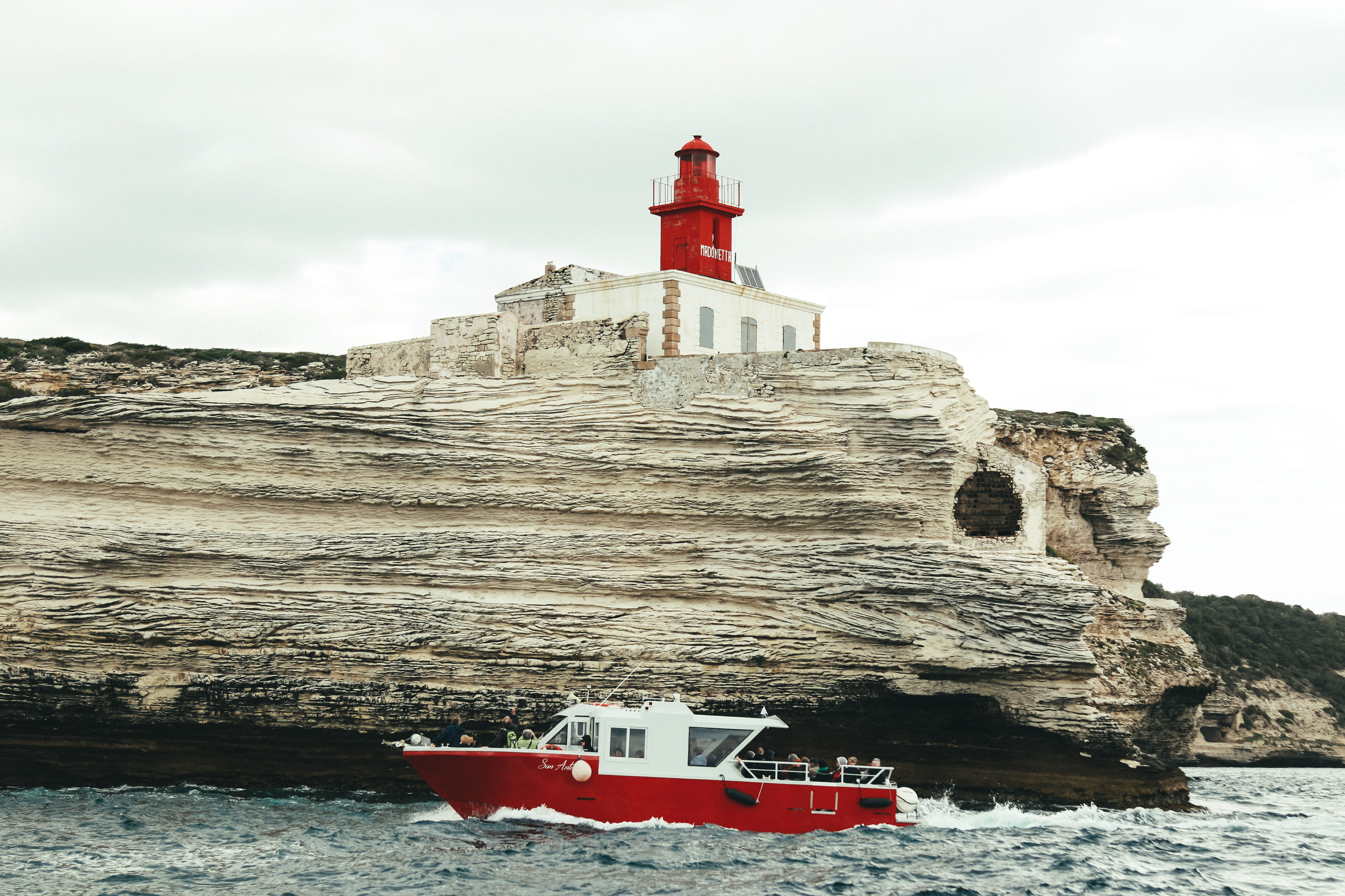 gray, daytime, waterfront, tree, built structure, ocean, building exterior, nature, boat, outdoors, formation, sky, structure, rock, guidance, tower, travel, HD Wallpaper