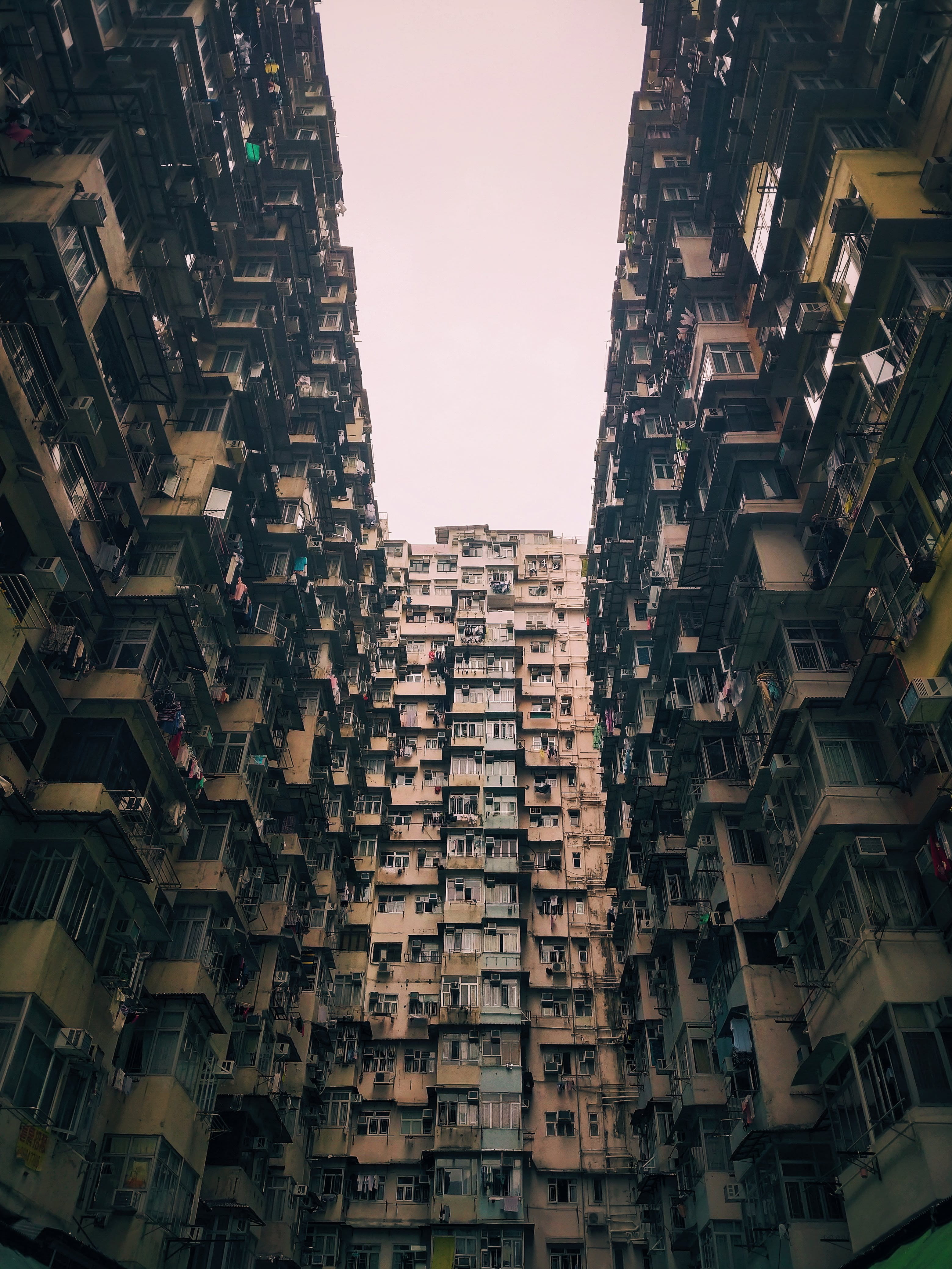 no people, multi, pattern, storey, low angle view, tall - high, hong kong, window, montane mansion, metropolis, high rise, road, built structure, repetition, Phone HD Wallpaper