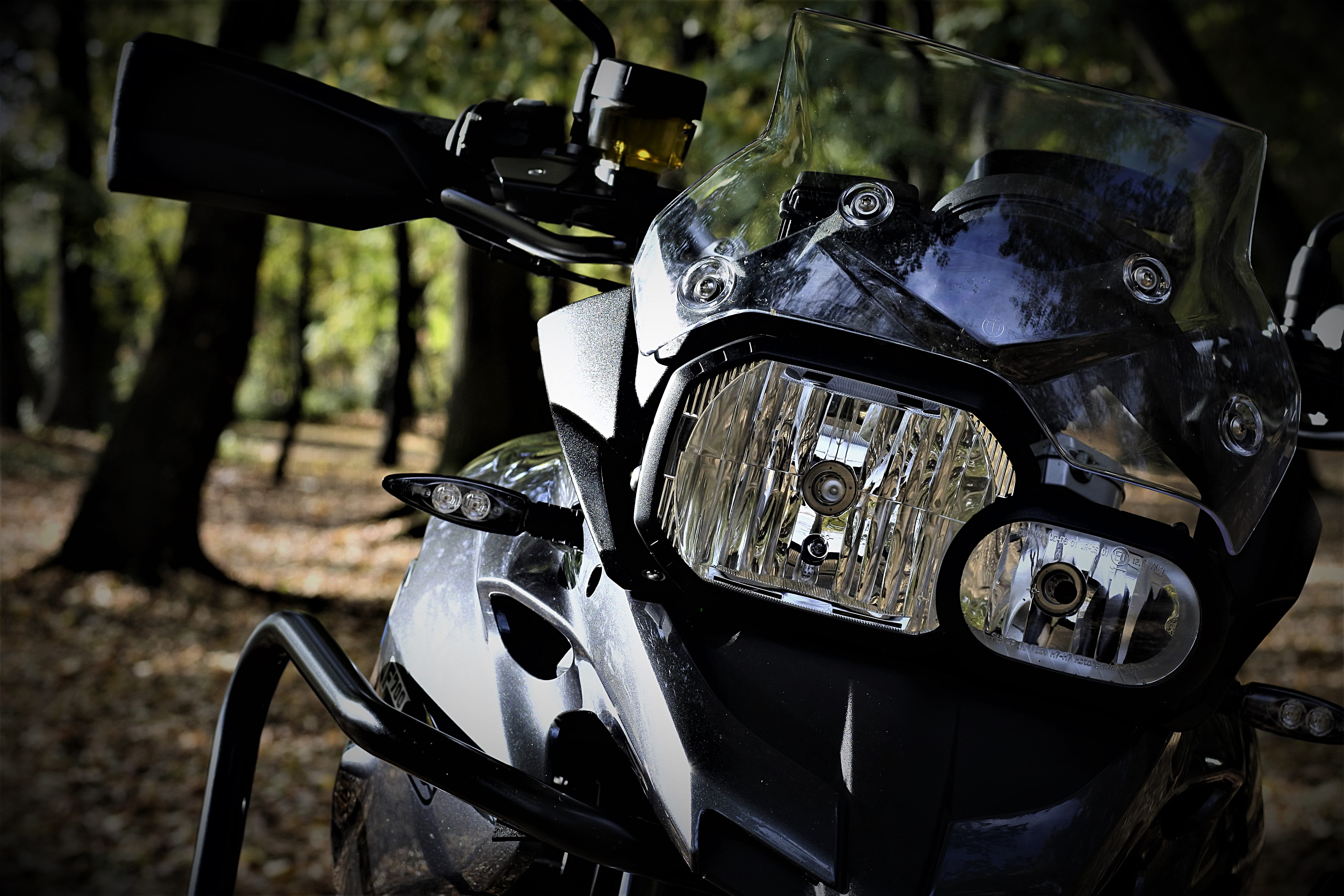 motorcycle, focus on foreground, nature, engine, safety, bmw, security, land vehicle, close-up, helmet, mode of transportation, 5K, transportation, outdoors, HD Wallpaper