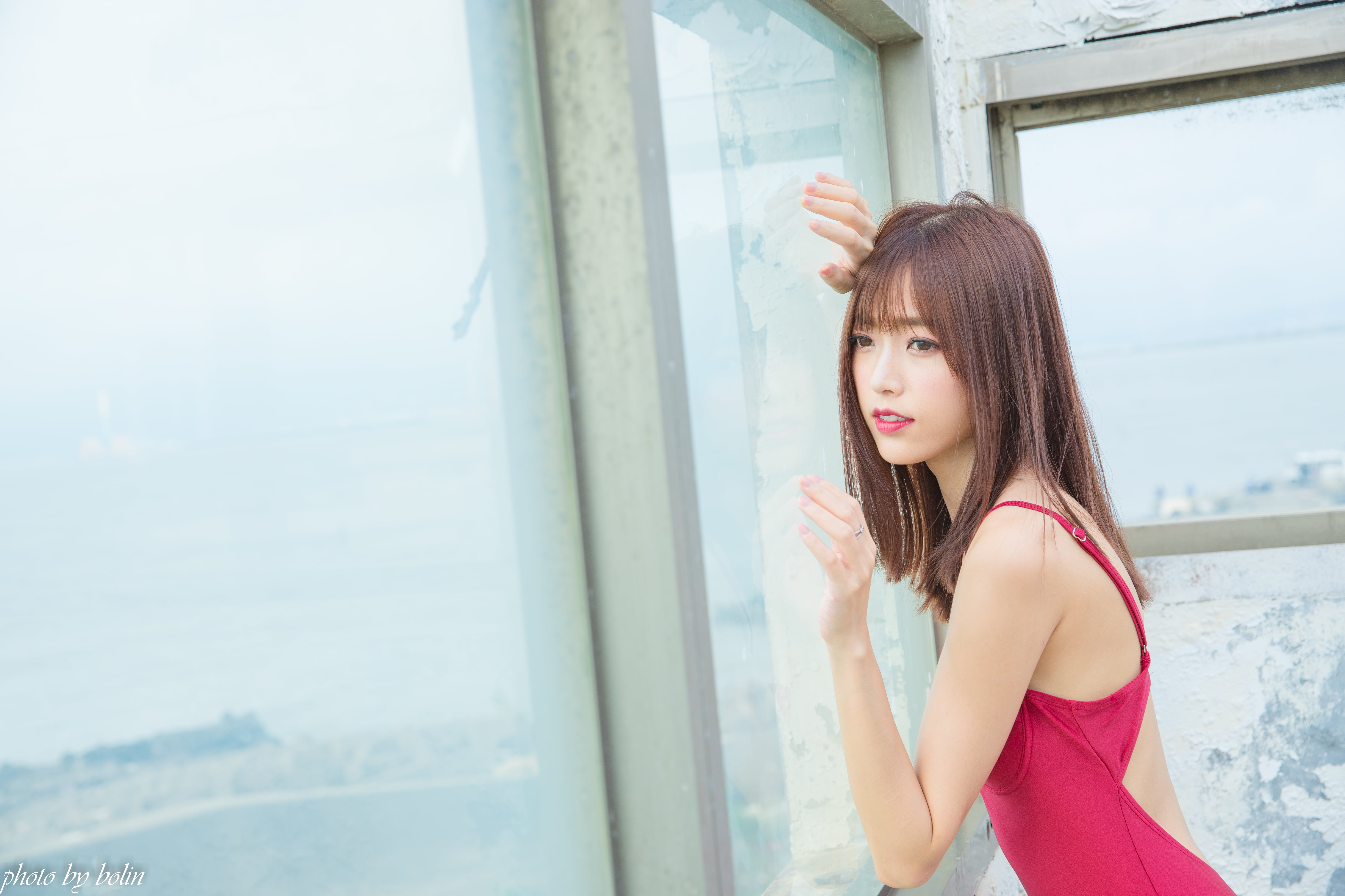 lifestyles, bangs, brunette, looking out window, waist up, outdoors, red lipstick, focus on foreground, side view, hairstyle, contemplation, hair, portrait, HD Wallpaper