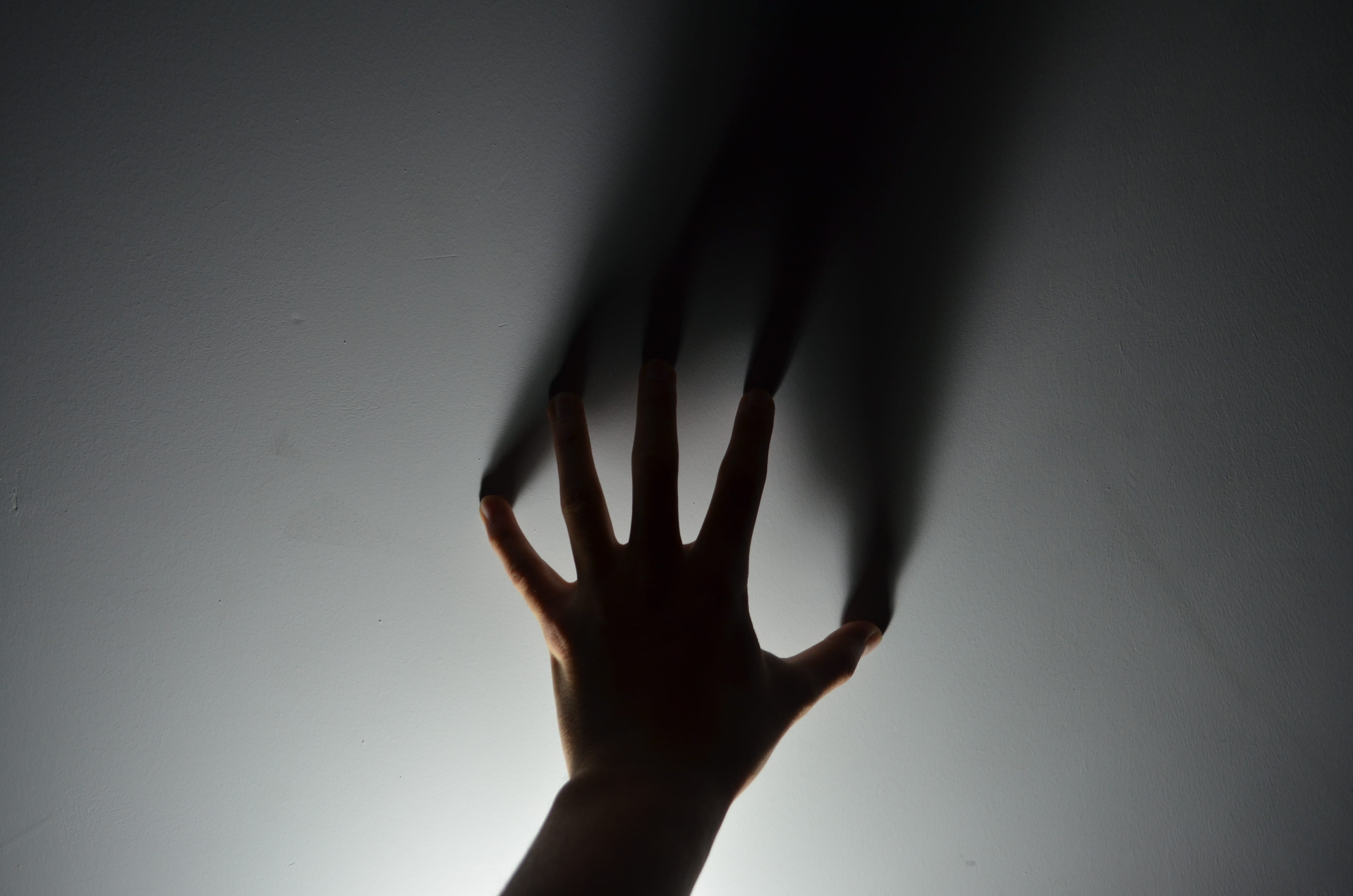 dark, mystery, light, human body part, shadow, silhouette, gray, human hand, emotion, 4K, eerie, human limb, surface, one person, contemplation, indoors, HD Wallpaper